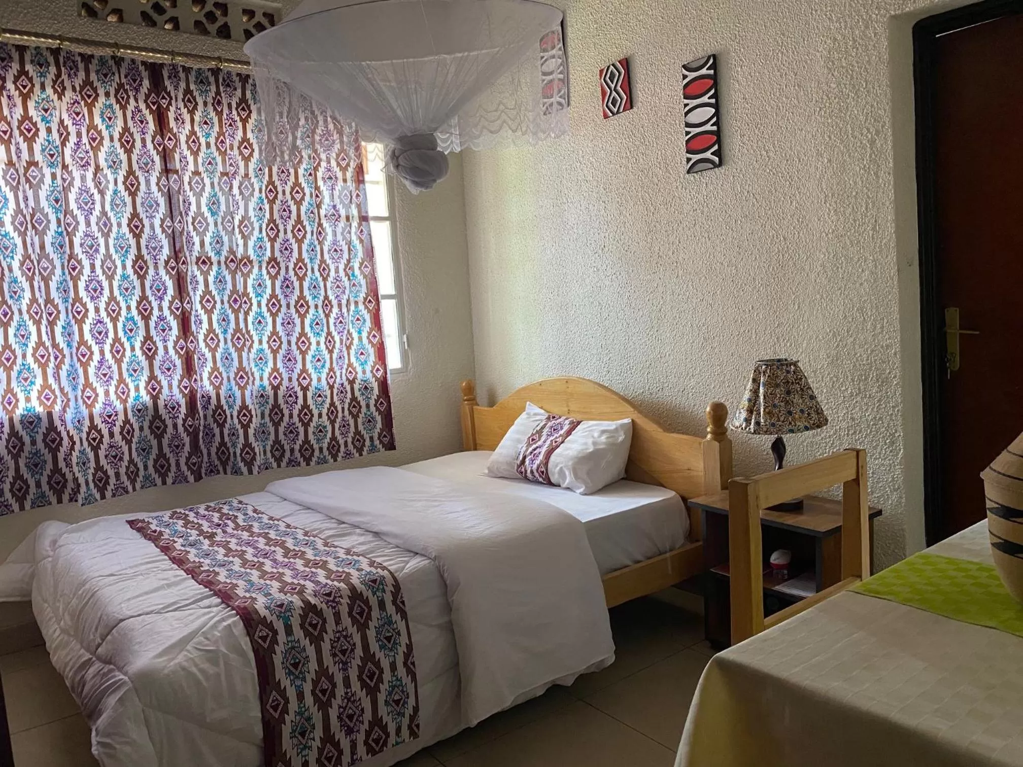 Bedroom in INZOZI AFRICA HOUSE B&B- Kacyiru