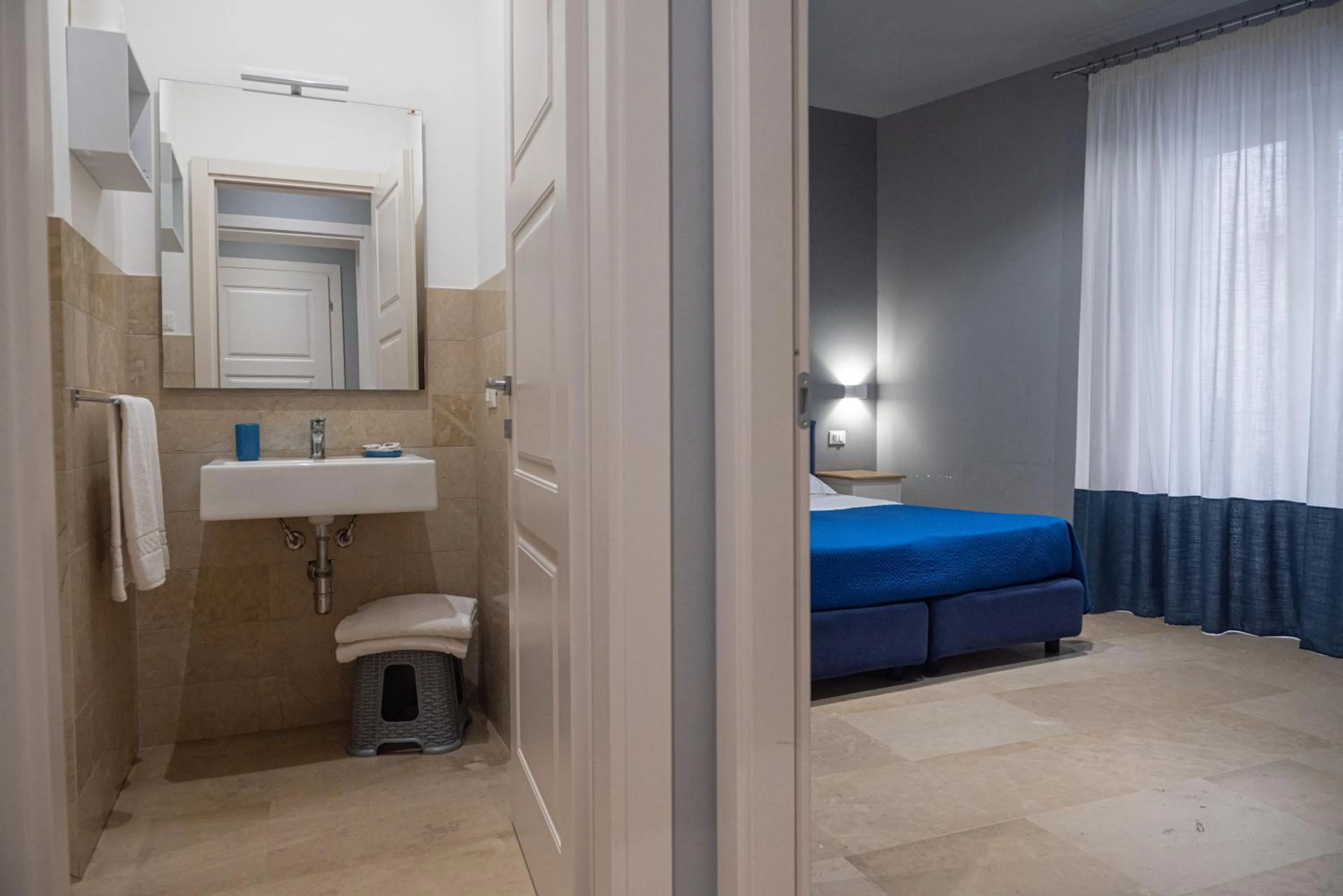 Photo of the whole room, Bed in ZIBIBBO SUITES & ROOMS - Aparthotel in Centro Storico a Trapani
