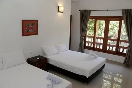 Bed in Finca Hotel Guali Santafe