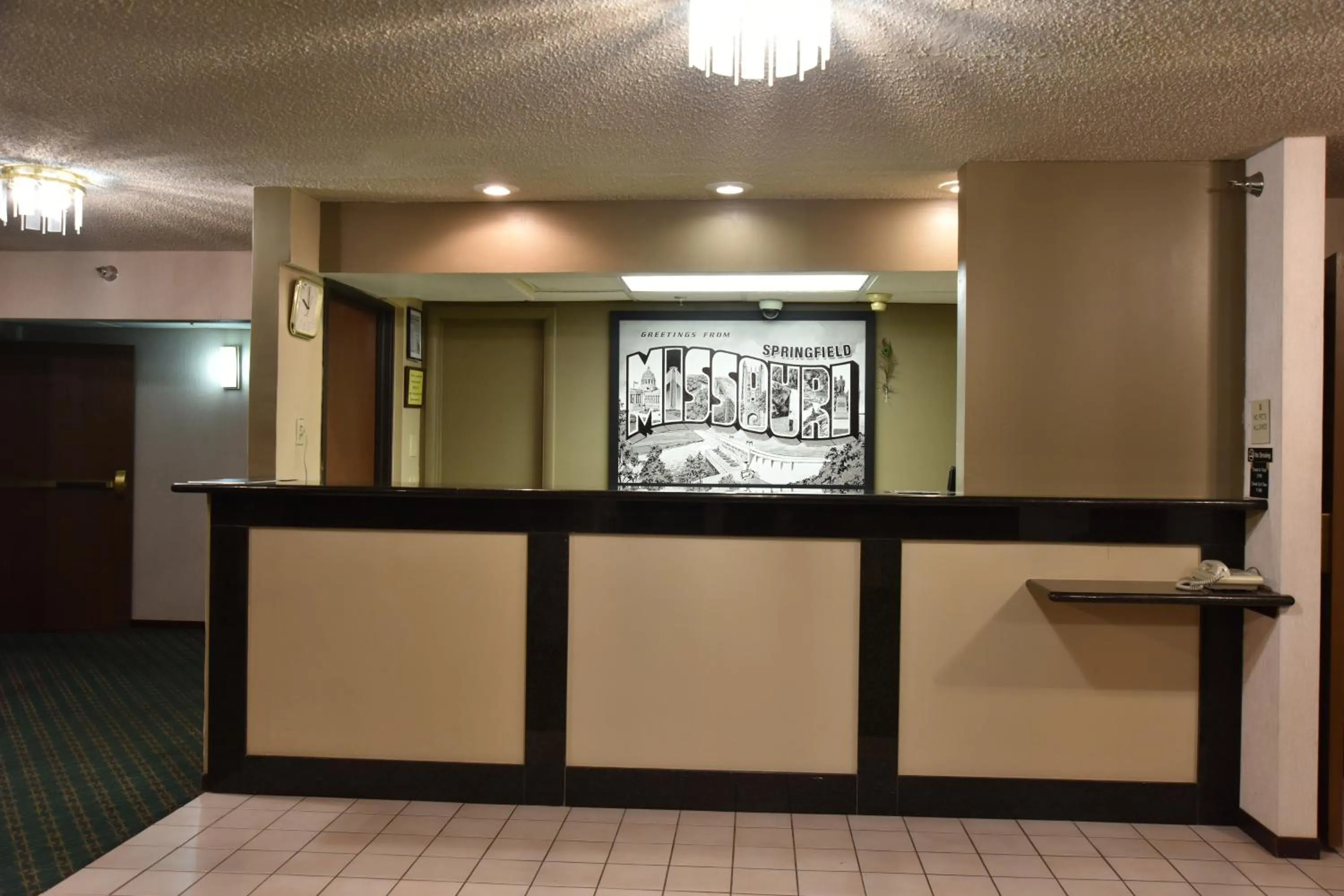 Lobby or reception in Super 8 by Wyndham Springfield-Battlefield