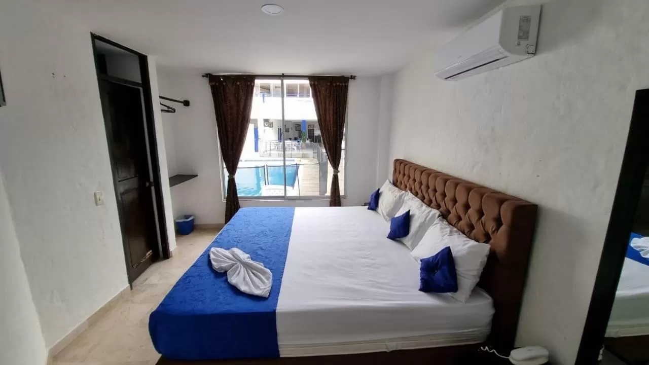 Bed in Blue Star Hotel