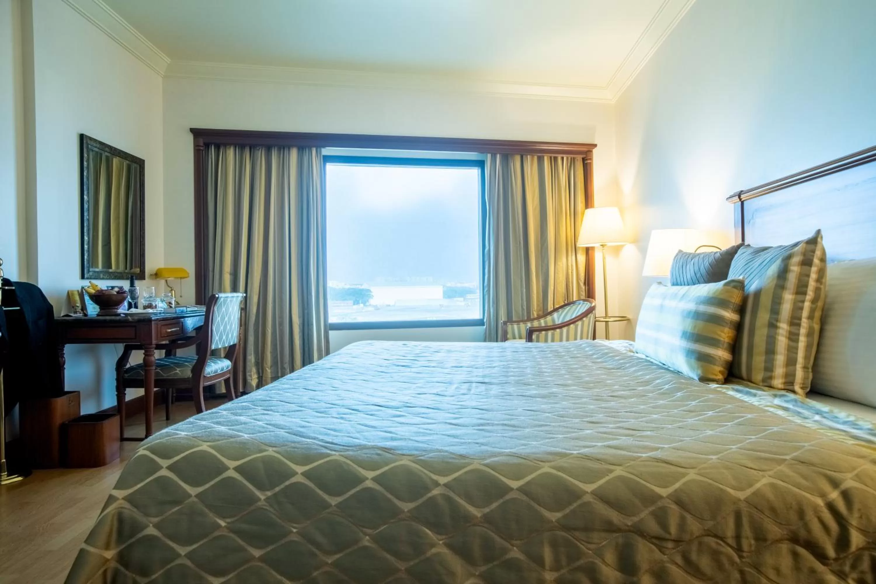 Bed in The Orchid Hotel Mumbai Vile Parle