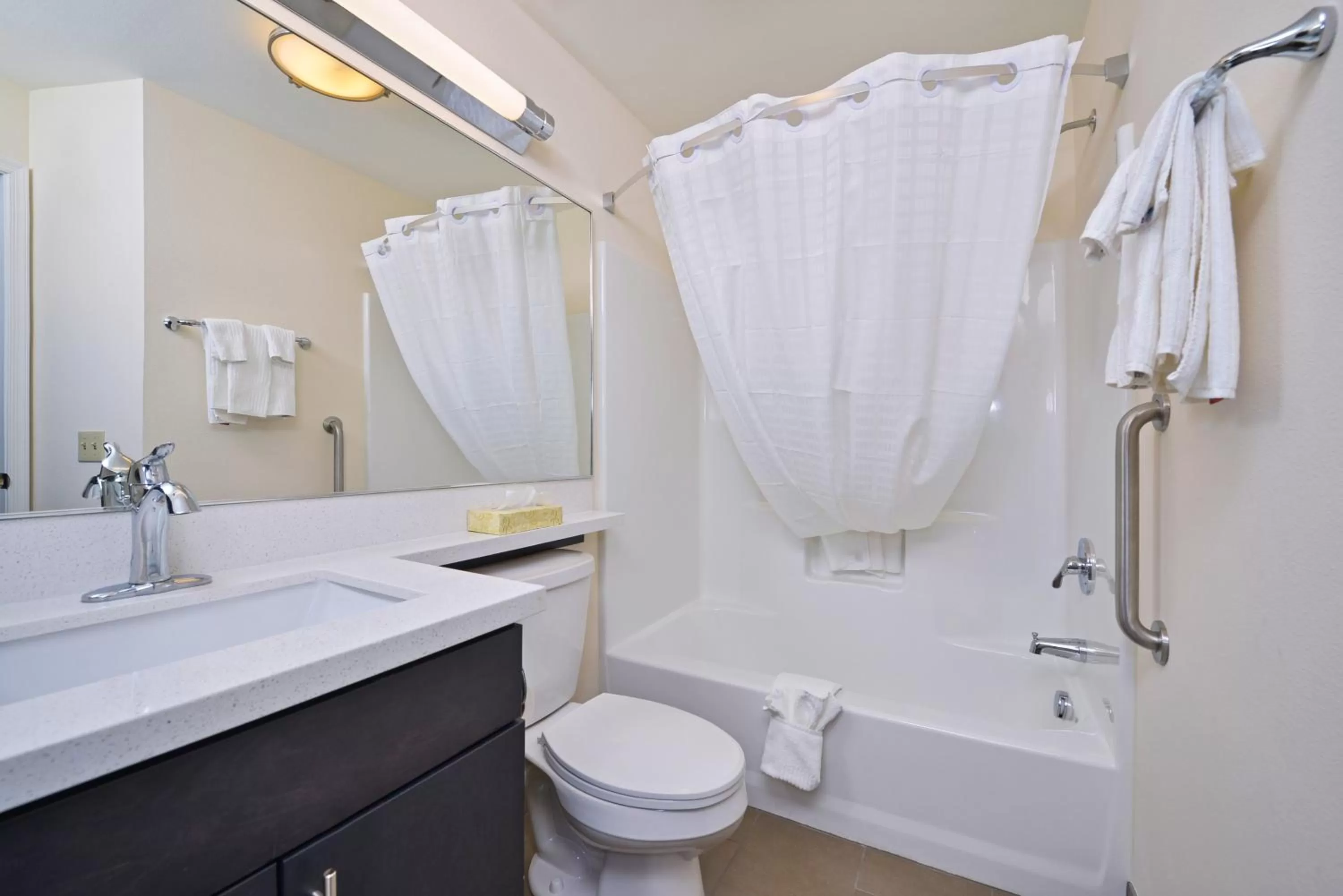 Bathroom in Candlewood Suites Harrisburg-Hershey by IHG