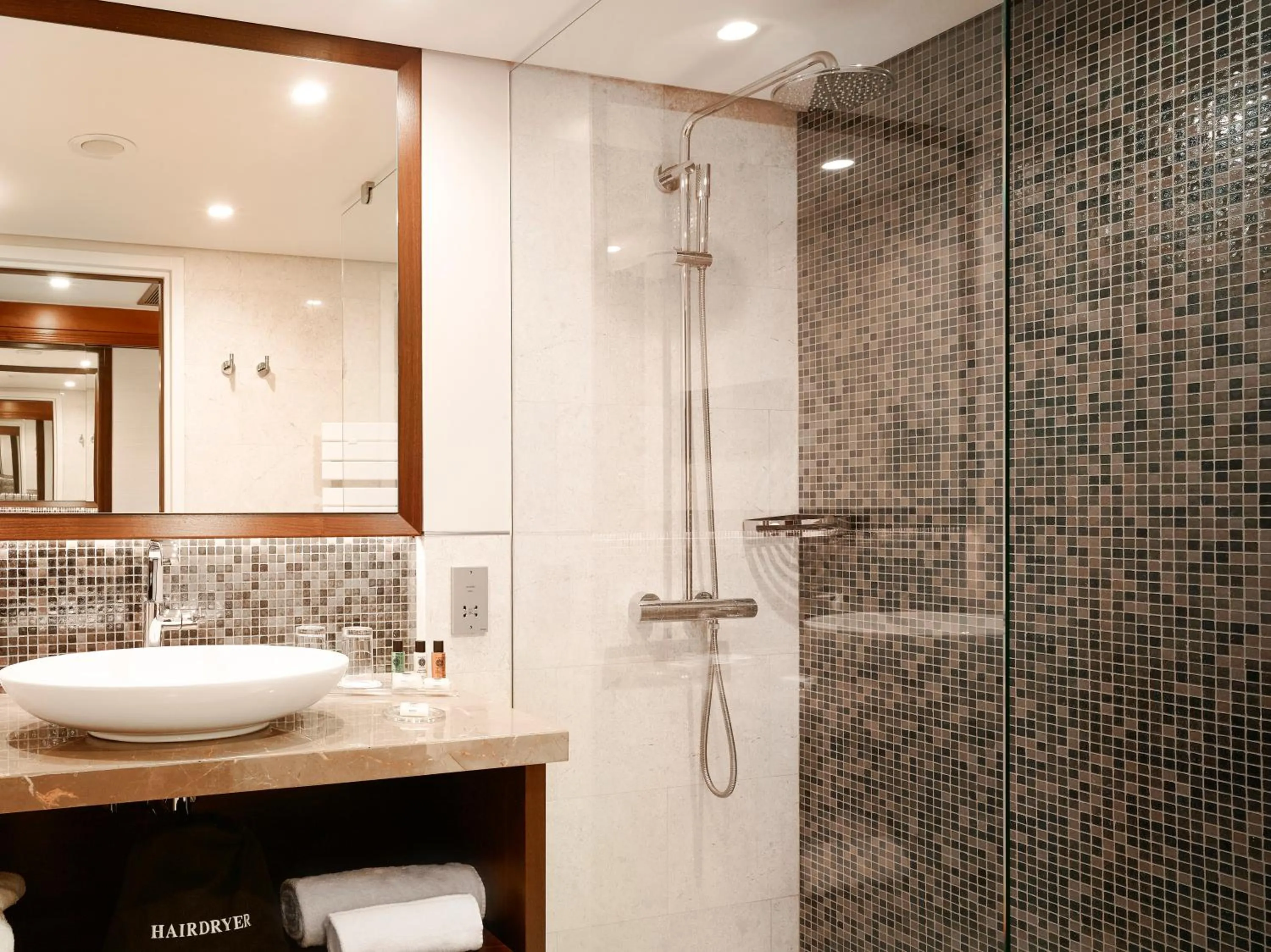 Shower in Crowne Plaza Bucharest by IHG