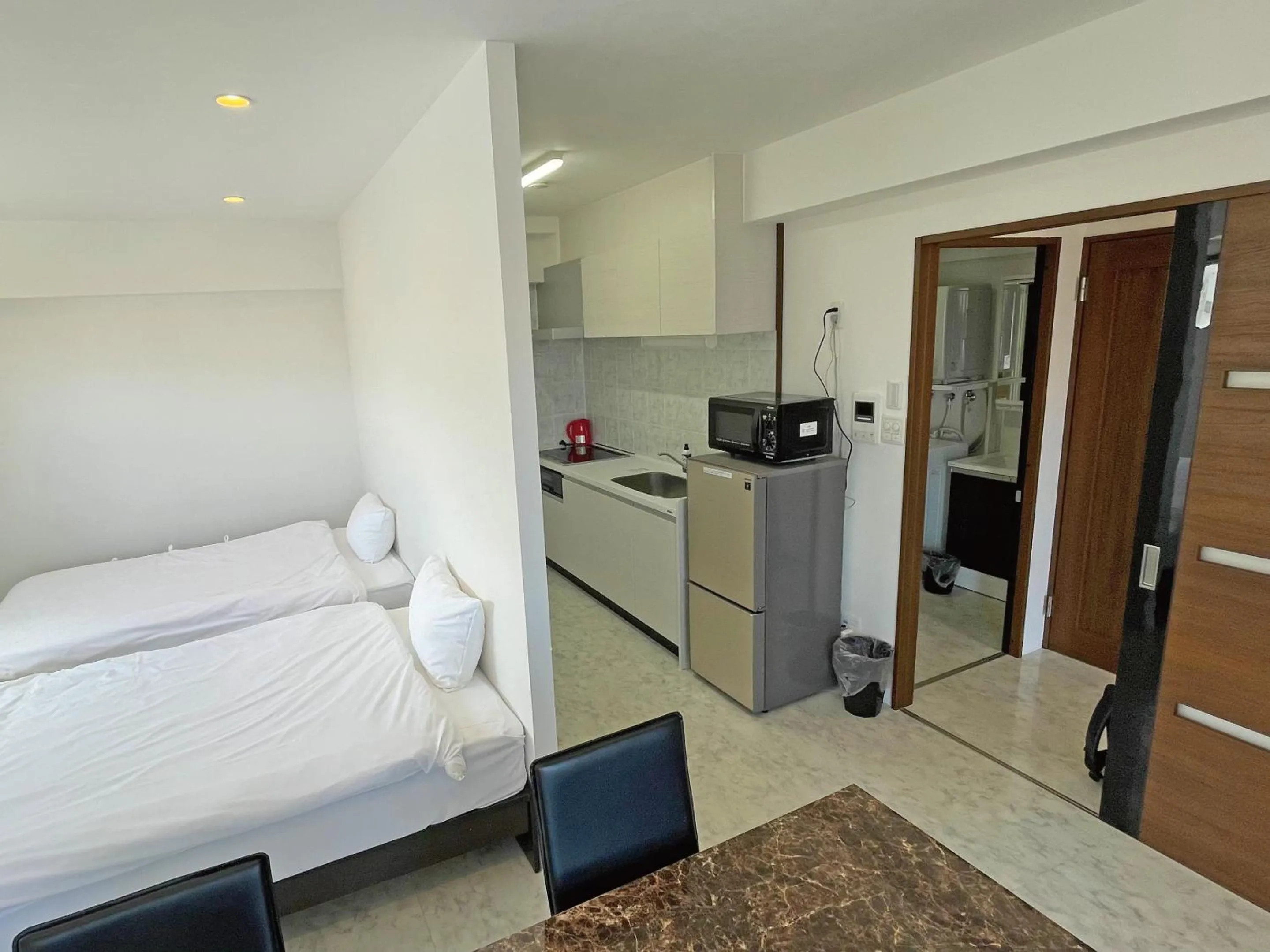 Living room, Bed in G-RATIS Omoromachi