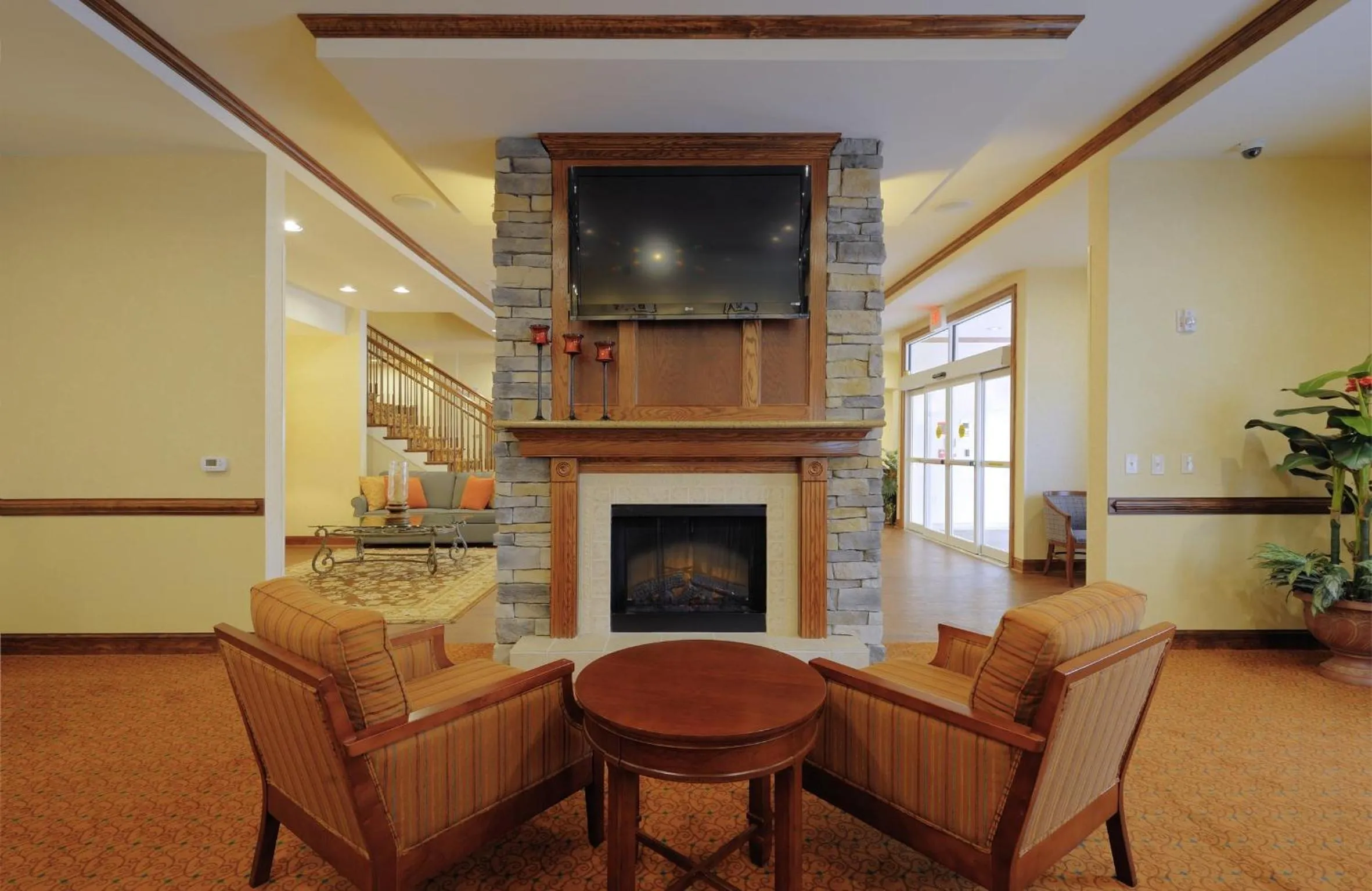 Communal lounge/ TV room in Country Inn & Suites by Radisson, Columbia at Harbison, SC