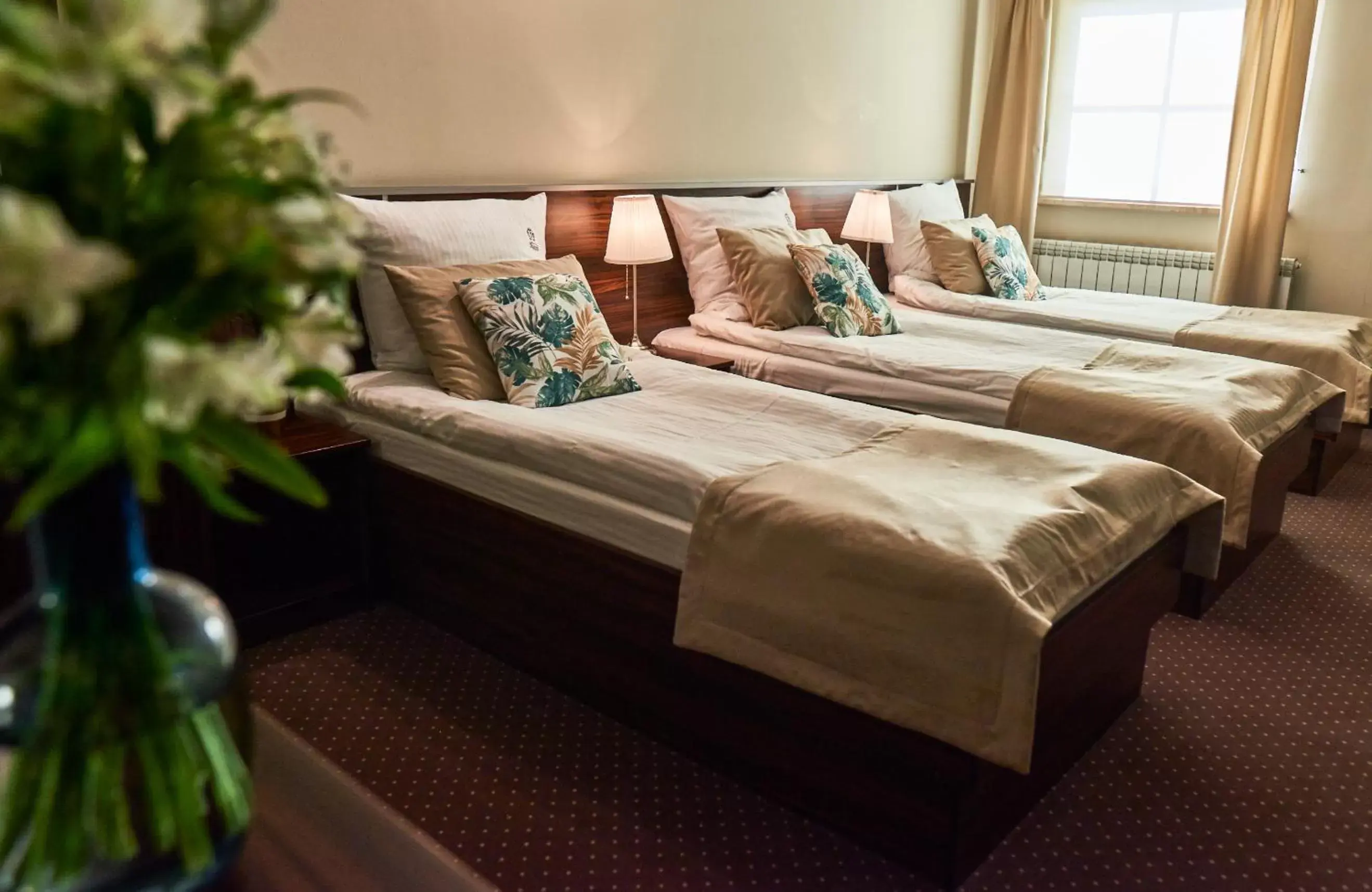 Standard Triple Room in Dworek Standard Triple Room in Dworek