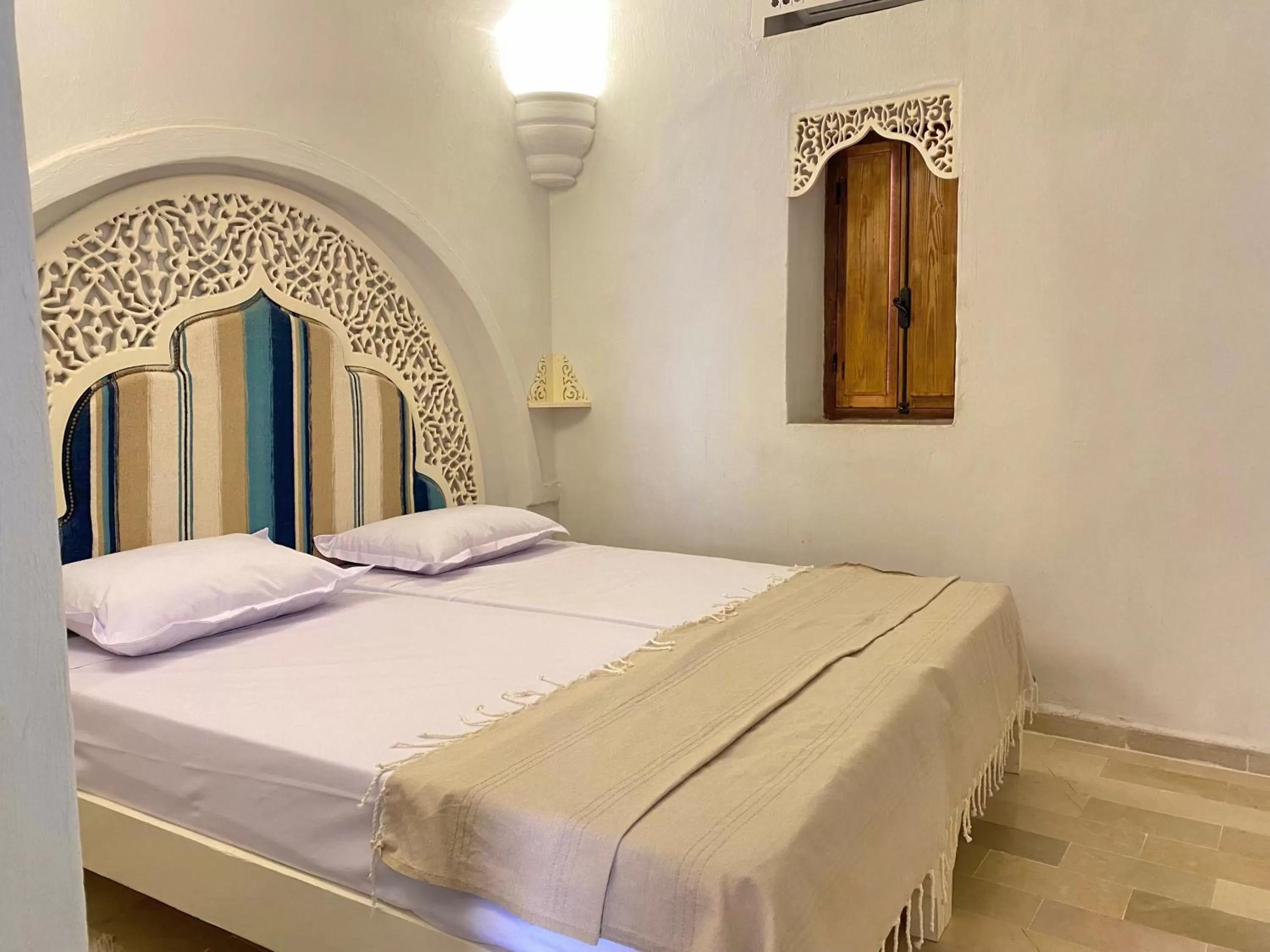 Bed in Hôtel Djerba Authentique - Au centre de Midoun