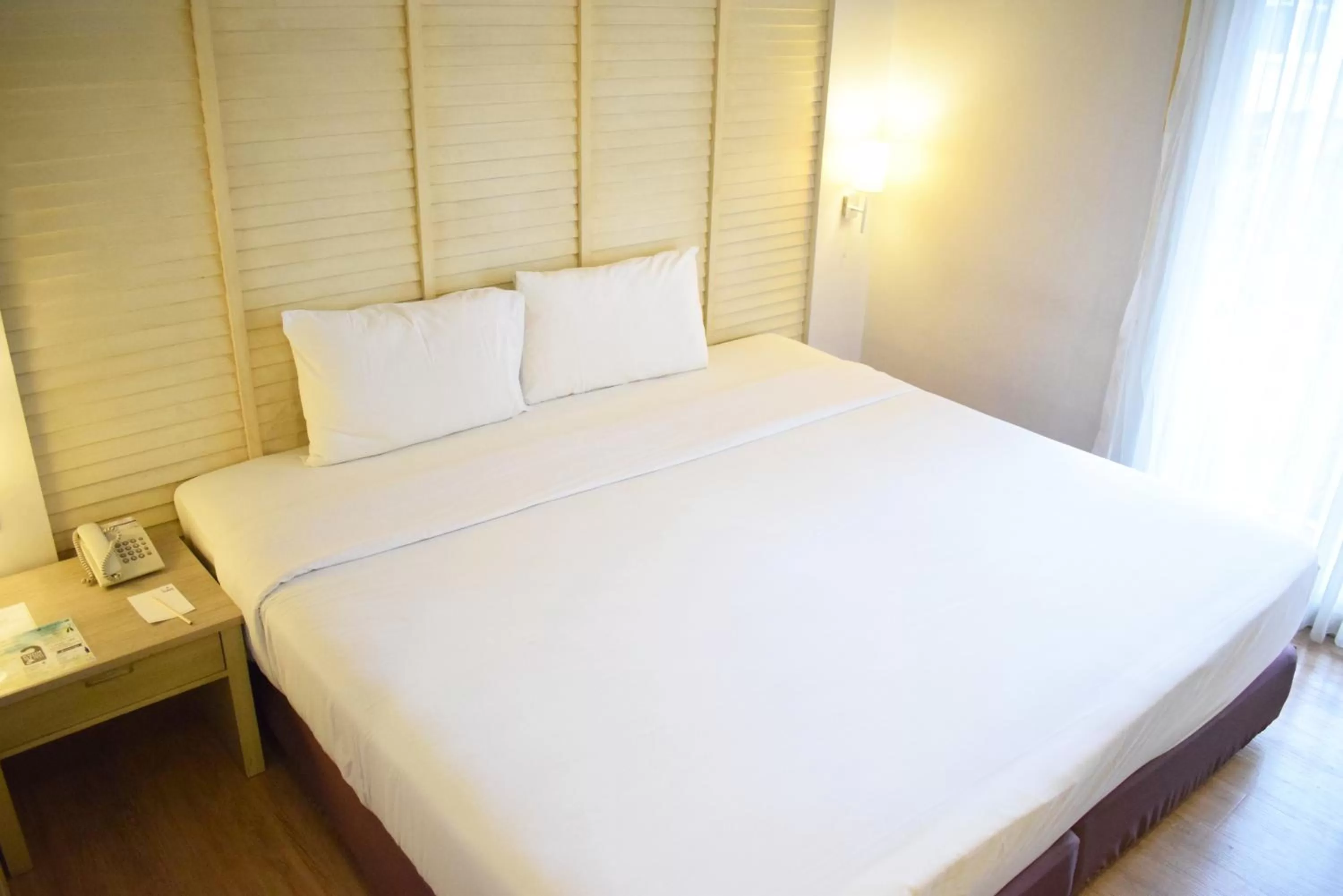 Bed in Trang Hotel Bangkok - SHA Plus