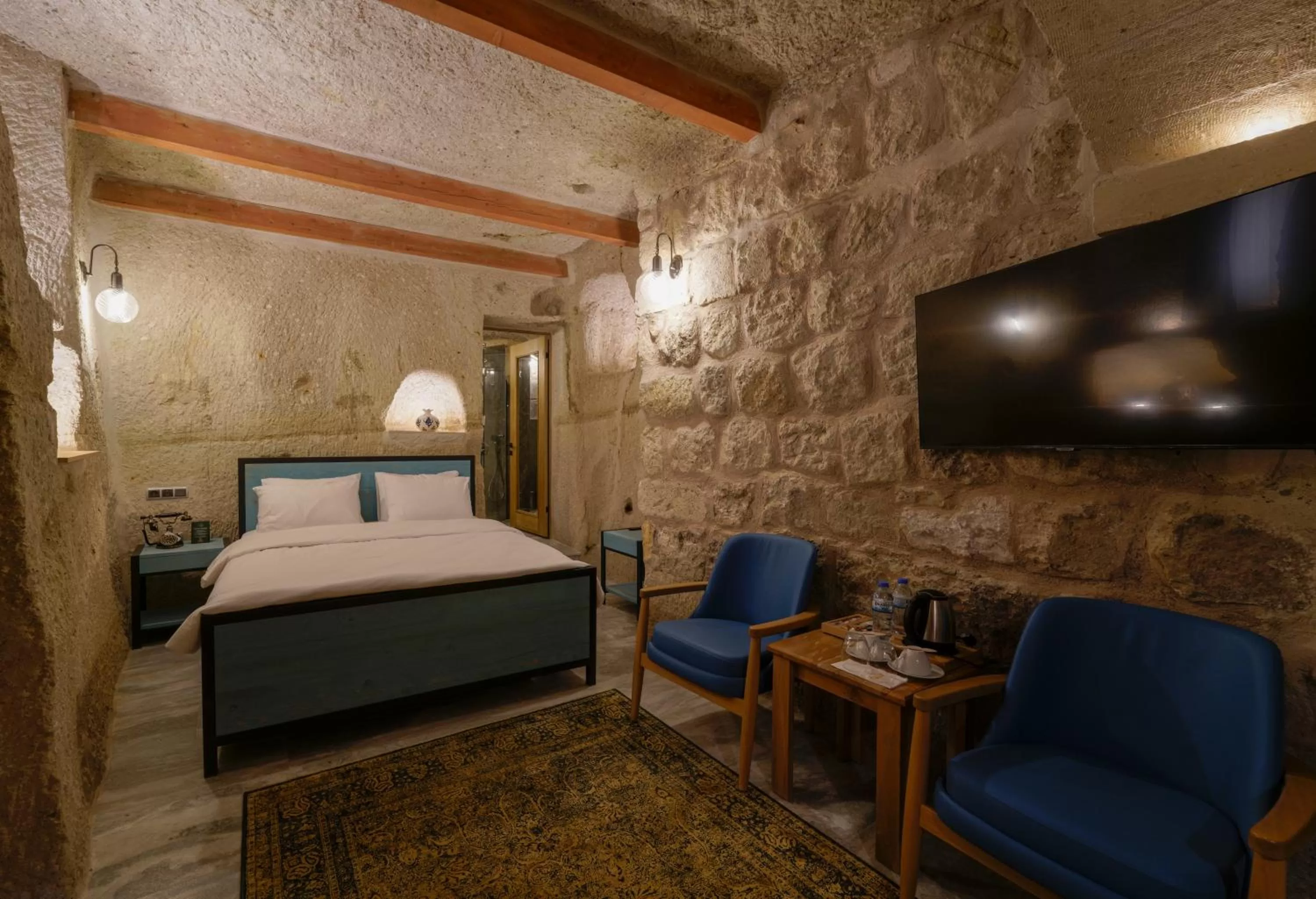 Bed in The Niche Cave Hotel