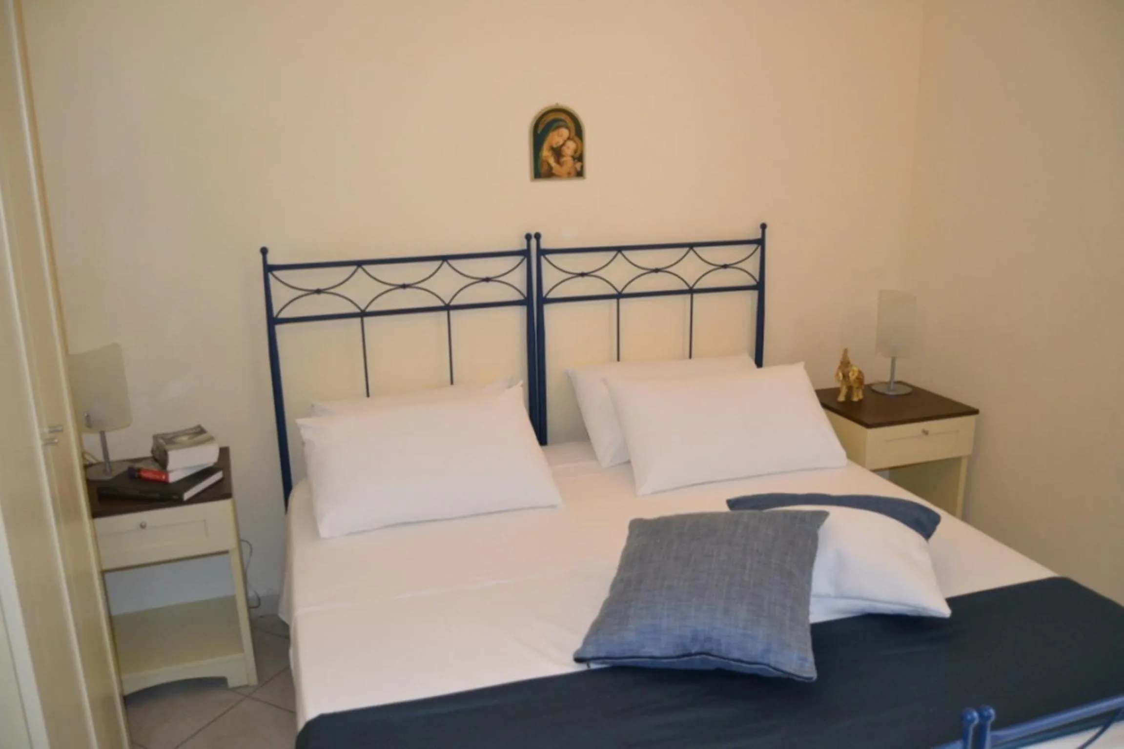 Bed in Al Pescatore Hotel & Restaurant