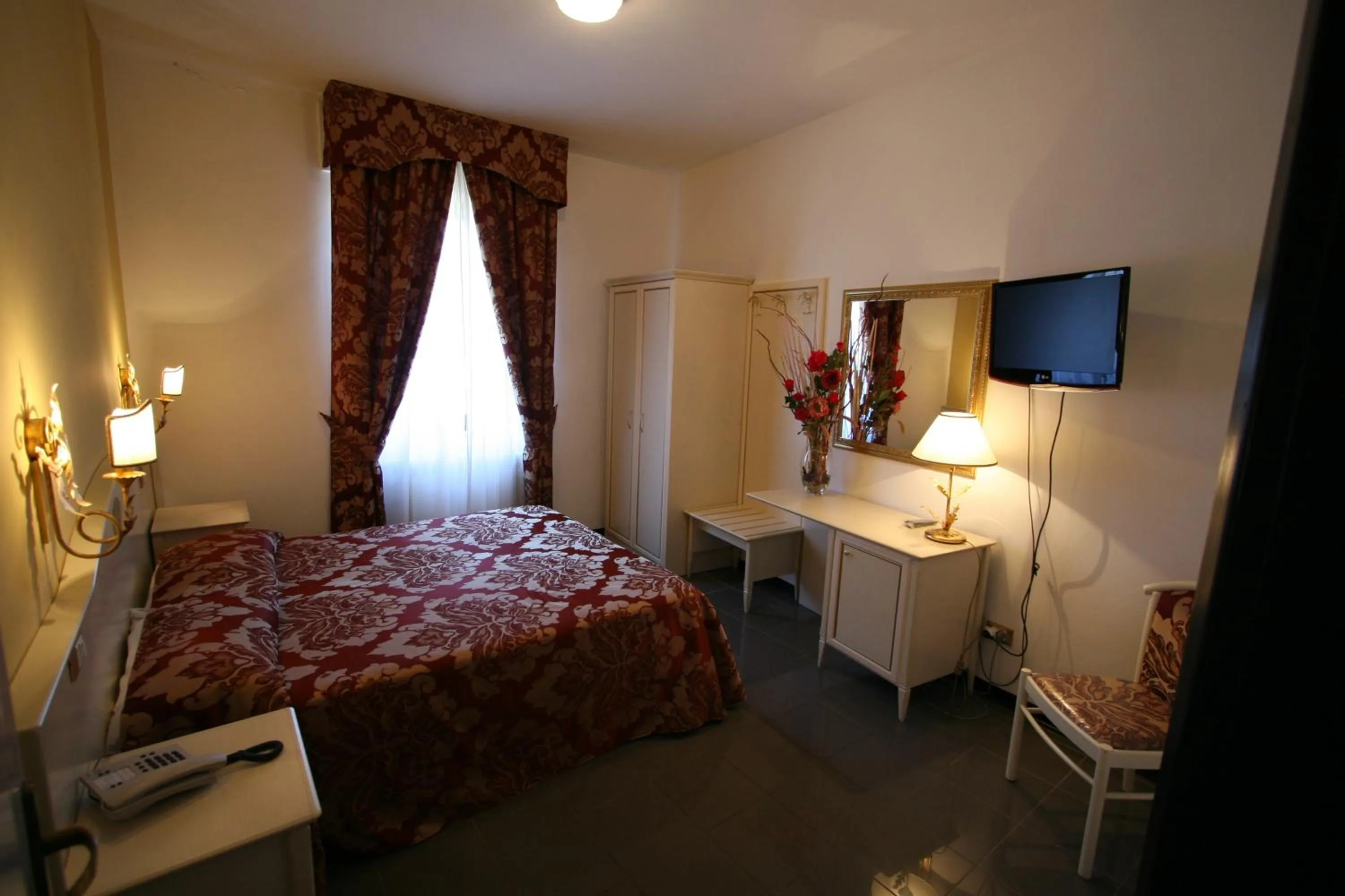 Bed in Hotel La Meridiana
