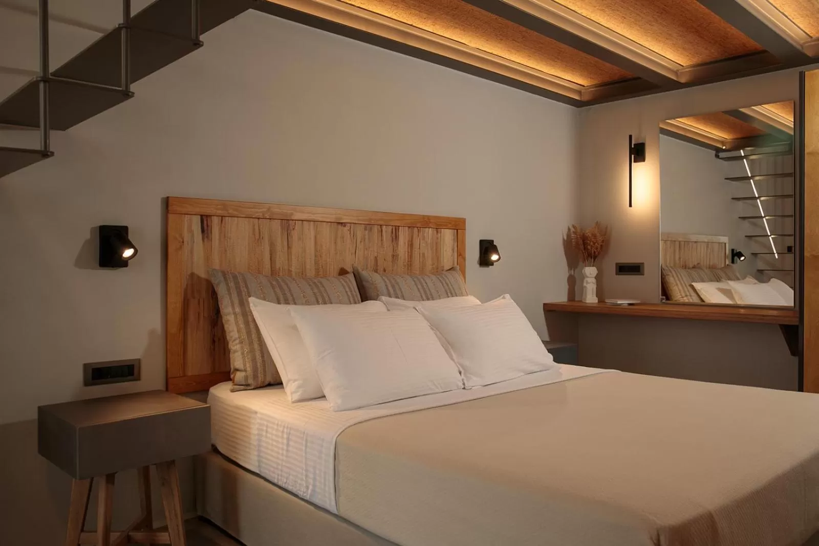 Bed in "Makava Suites" Your Luxe Urban Sanctuary
