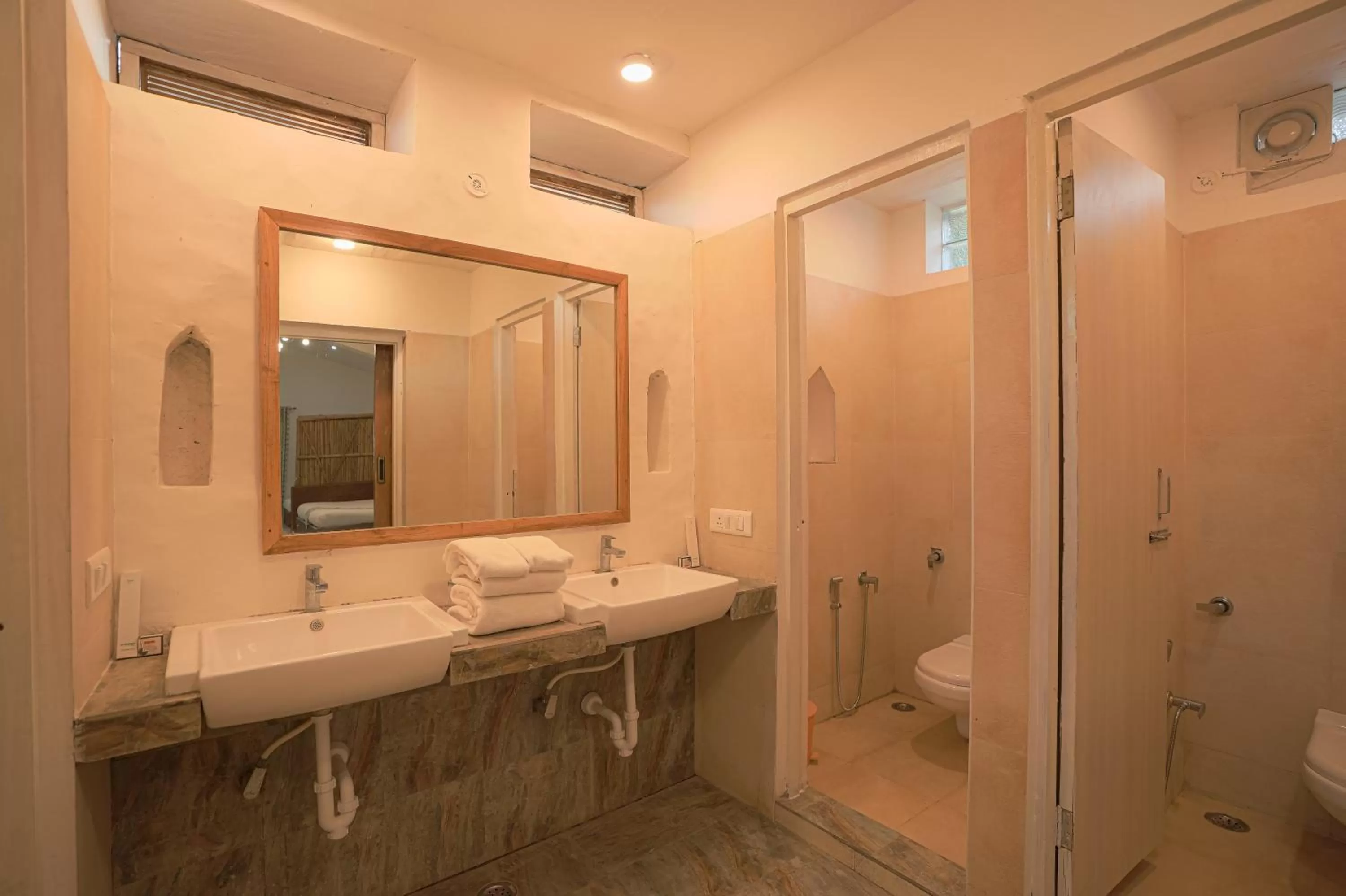 Bathroom in Astroport Sariska Treetop by Eight Continents