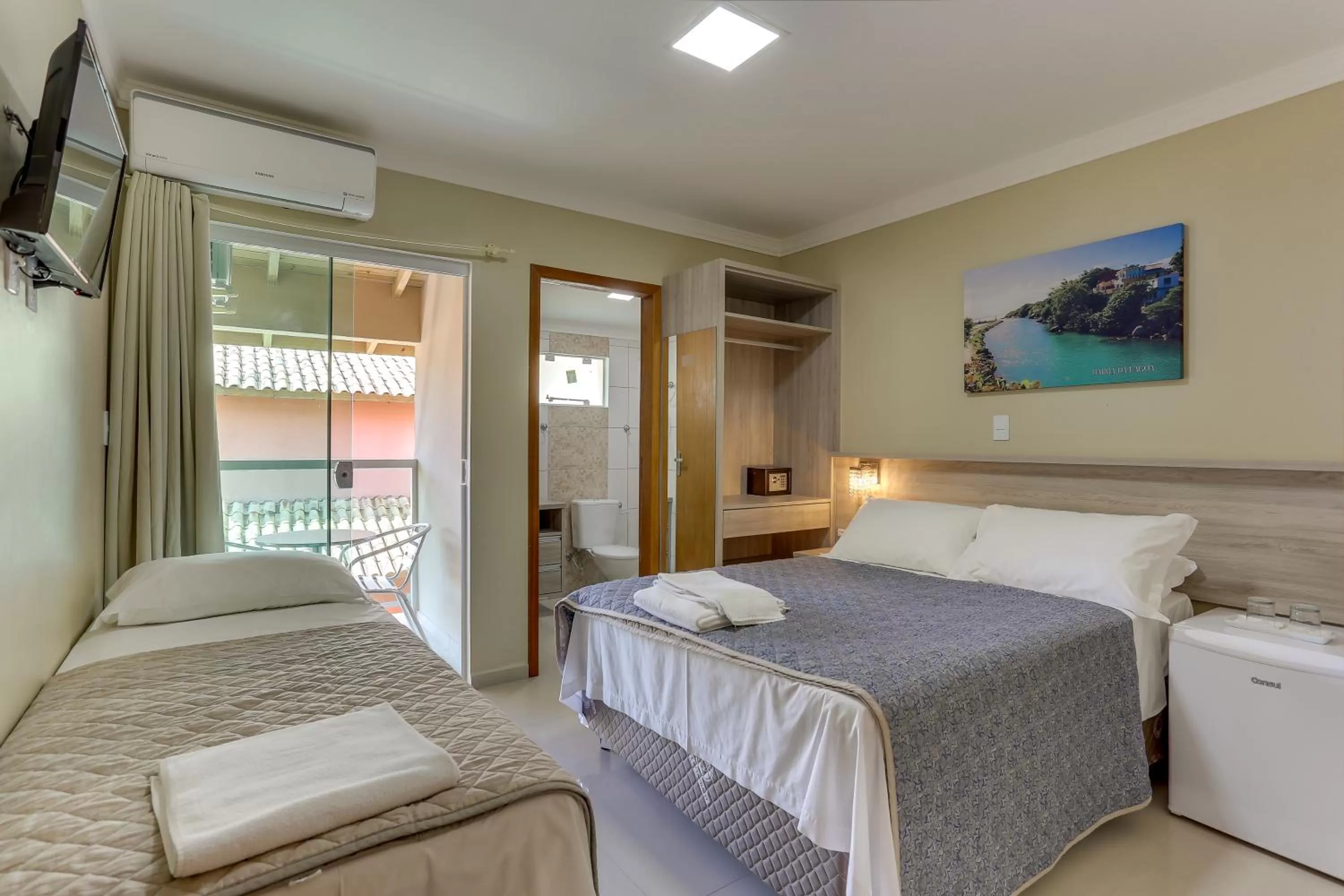 Bed in Pousada Tissiano