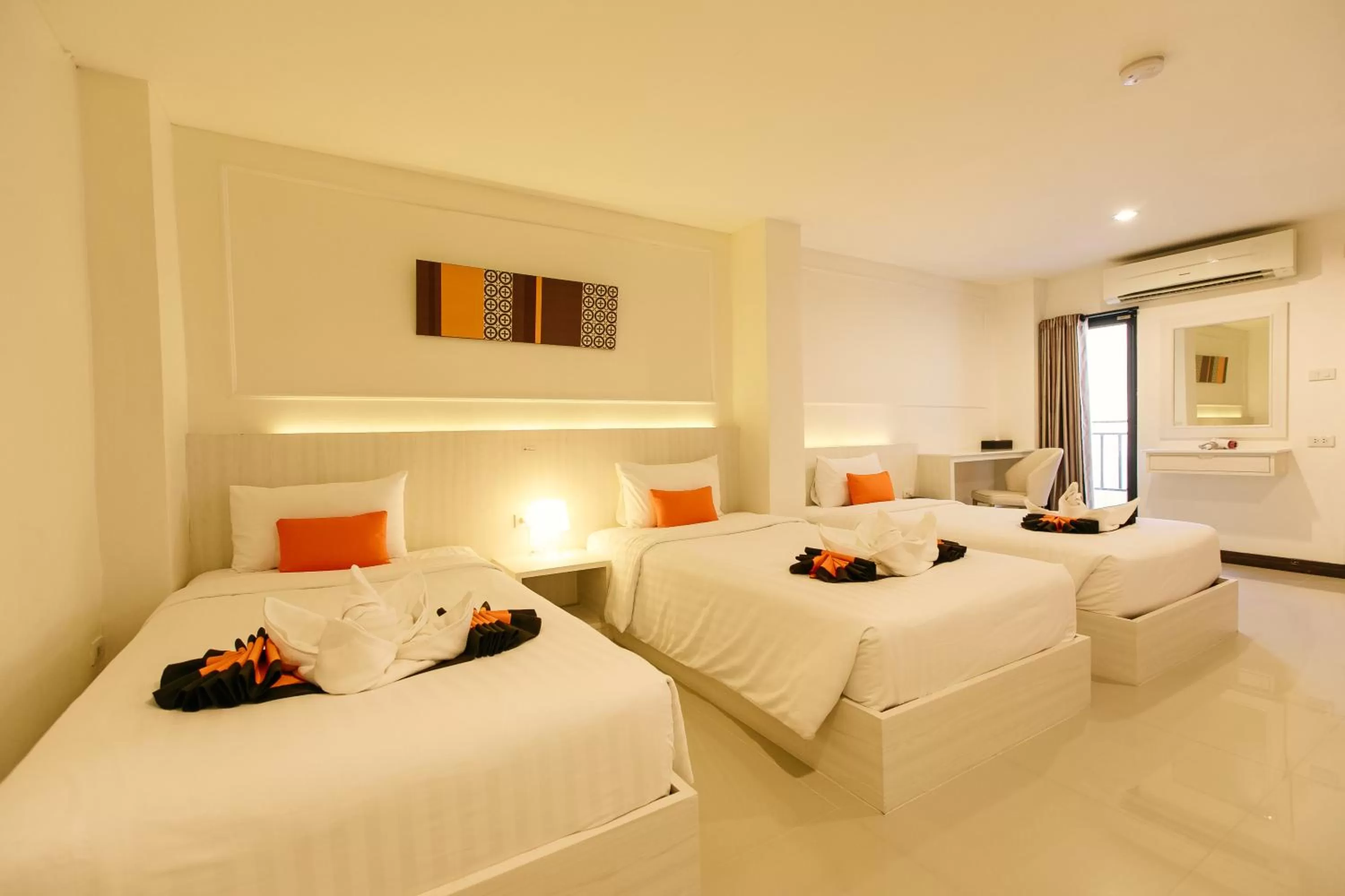 Bed in De Hug Hotel & Residence