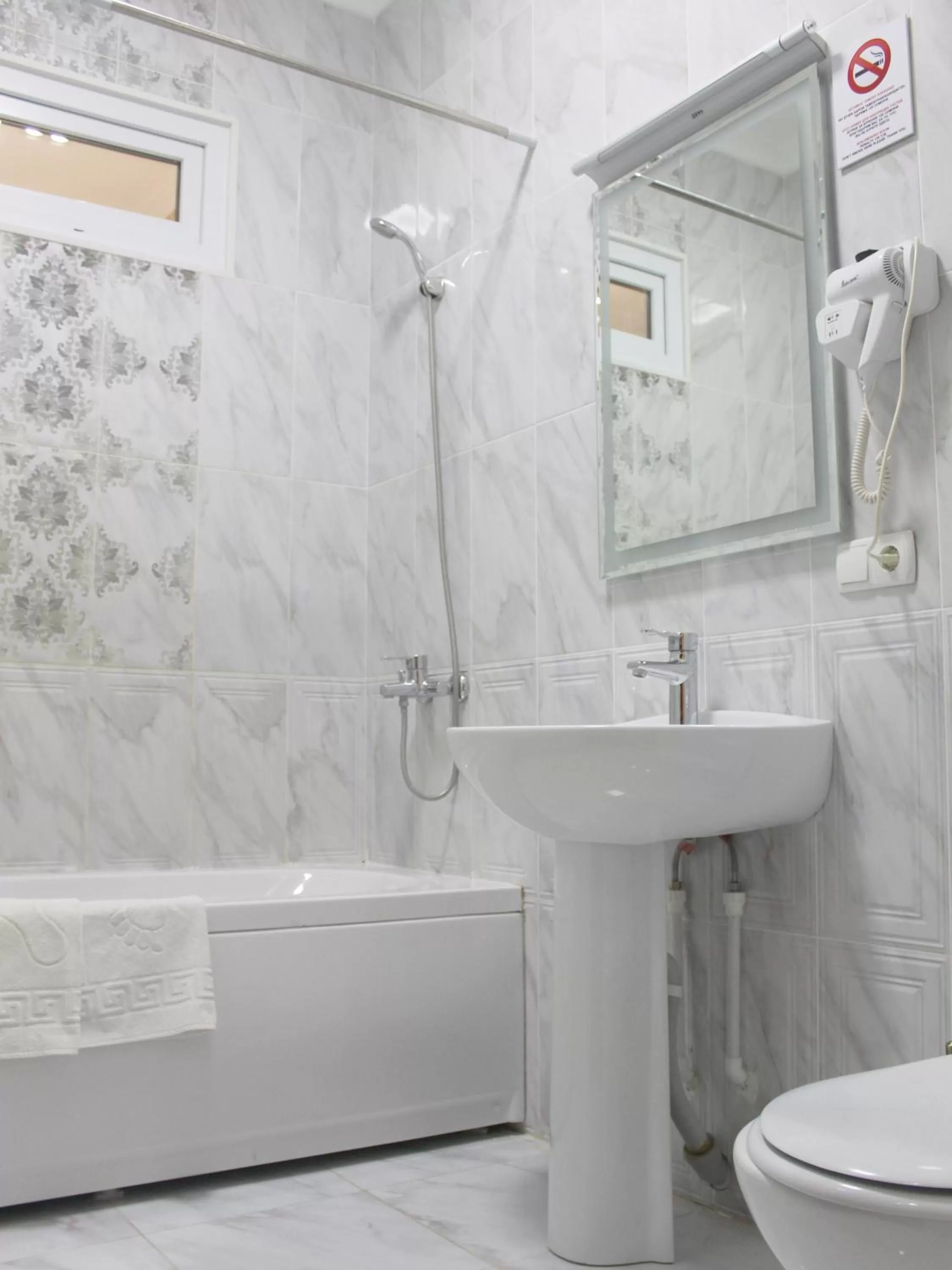 Bathroom in Armon Apart Hotel