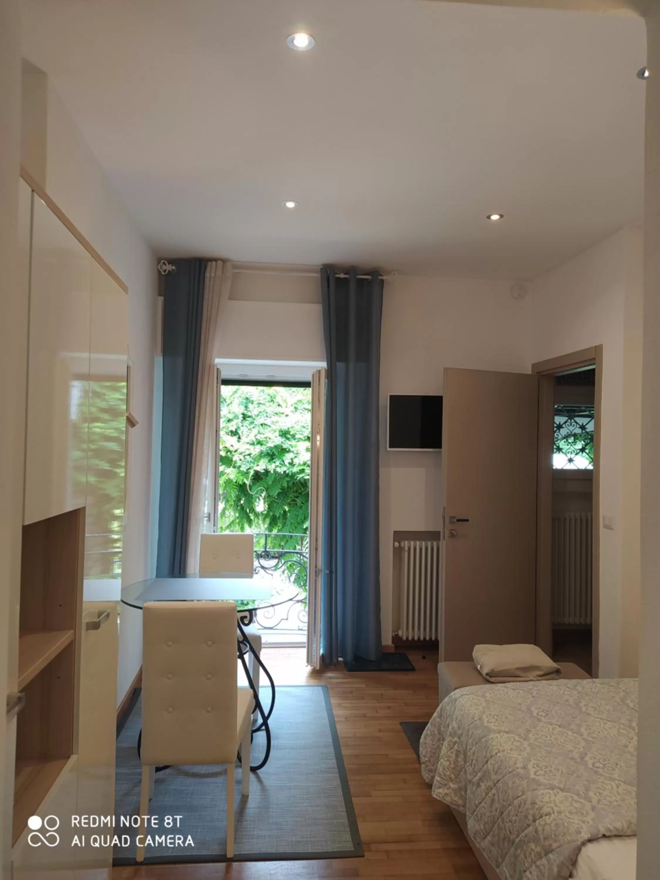 Bed, TV/Entertainment Center in "La Selvetta" bed and breakfast