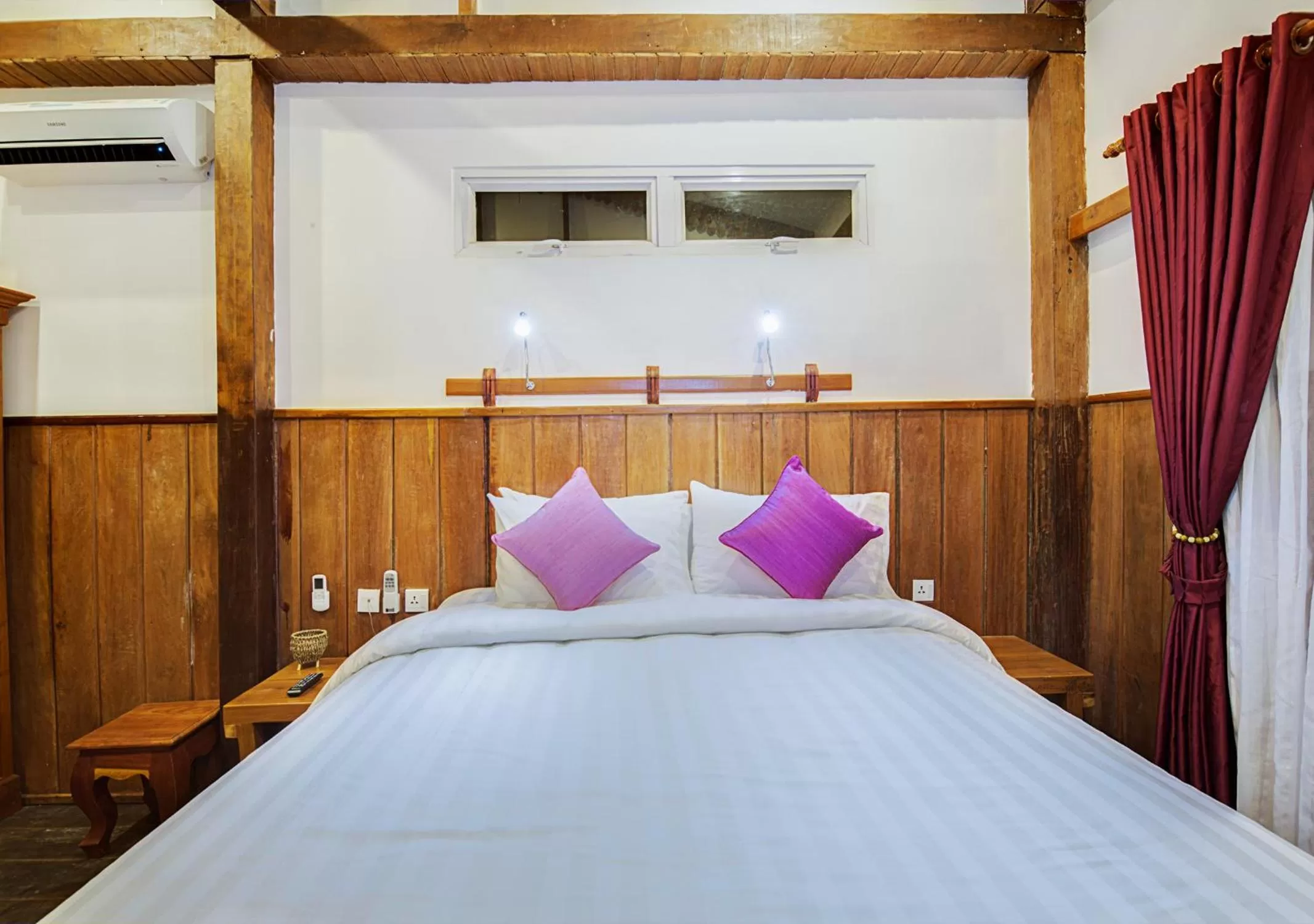 Bed in Maison Model d'Angkor