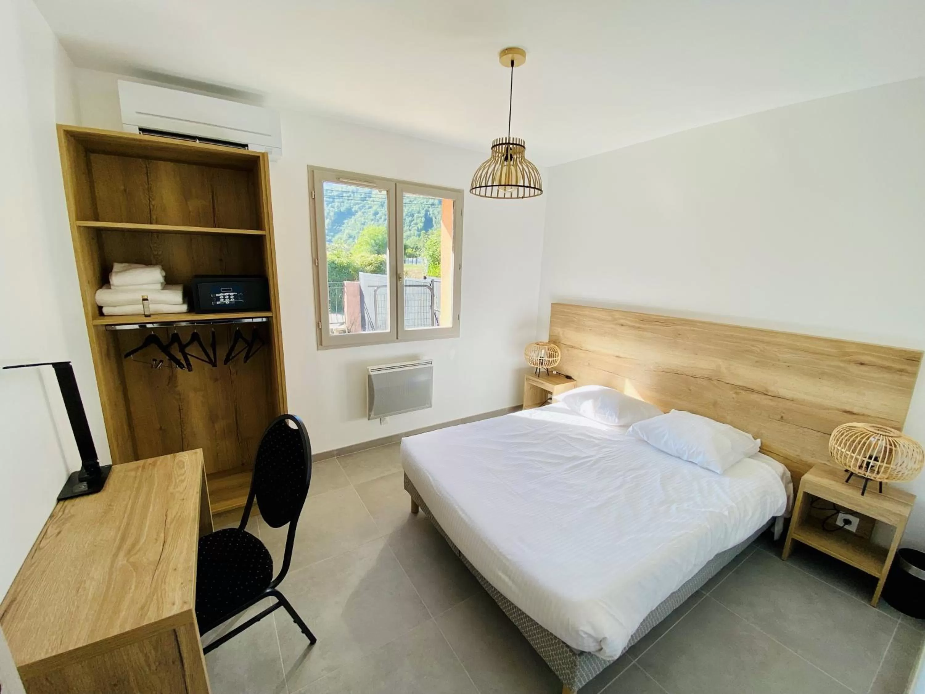 Photo of the whole room, Bed in Les Villas du Domaine de Suzel