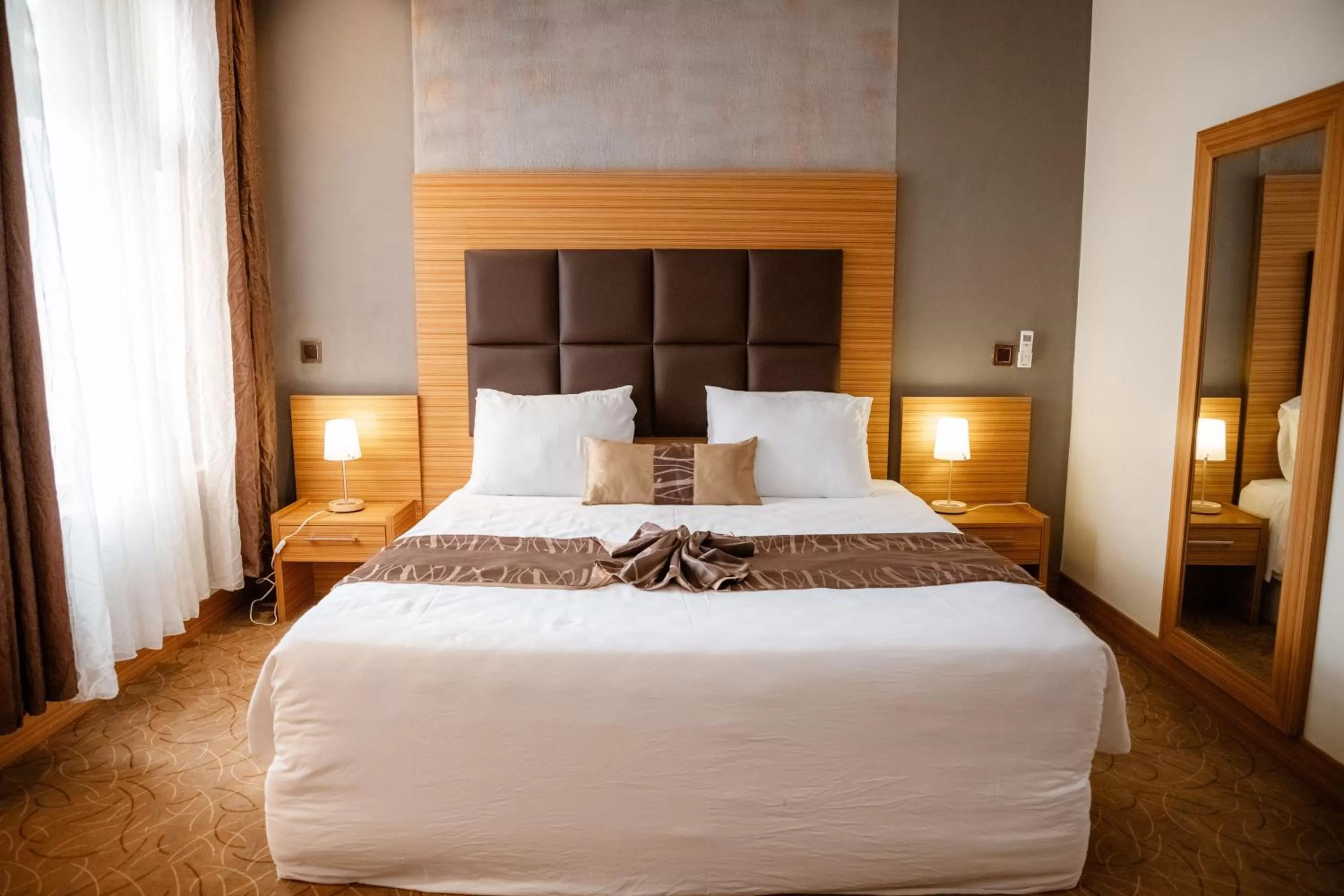 Bed in Ndaru Luxury Suites