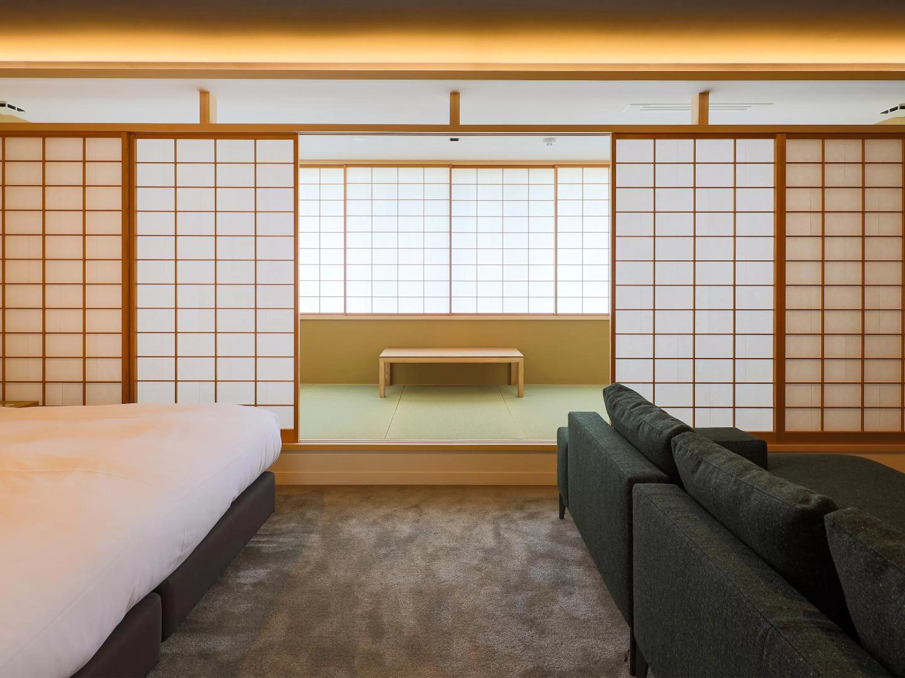 Living room, Bed in Hotel Muso