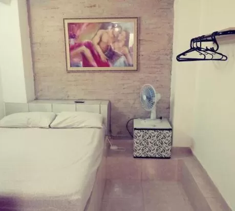 Bed in Pousada Villas