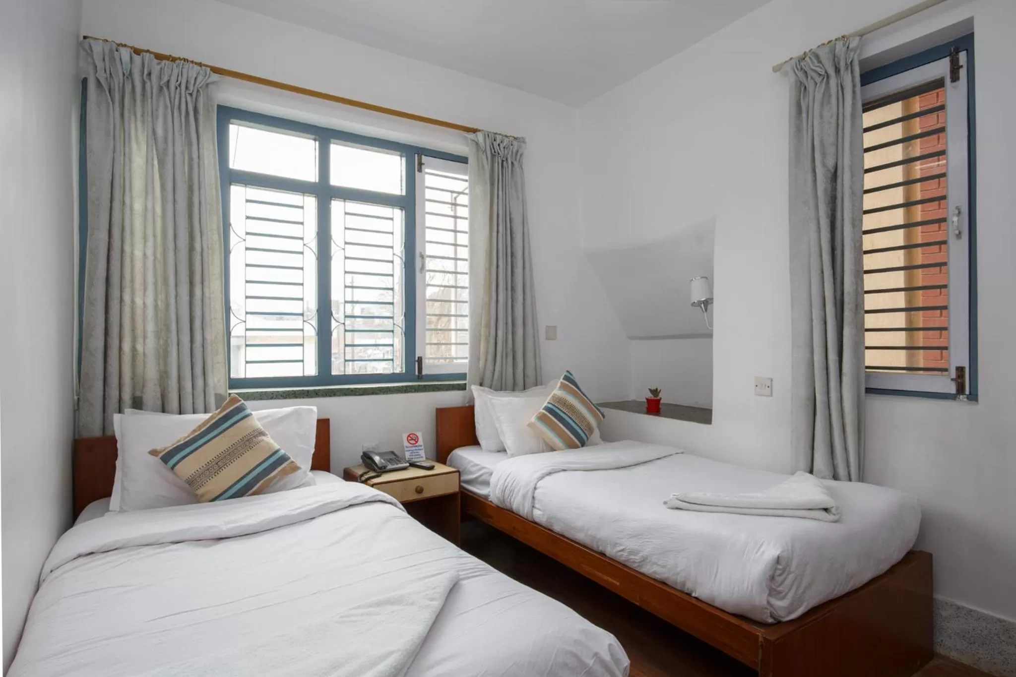 Bed in Pacific Guest House