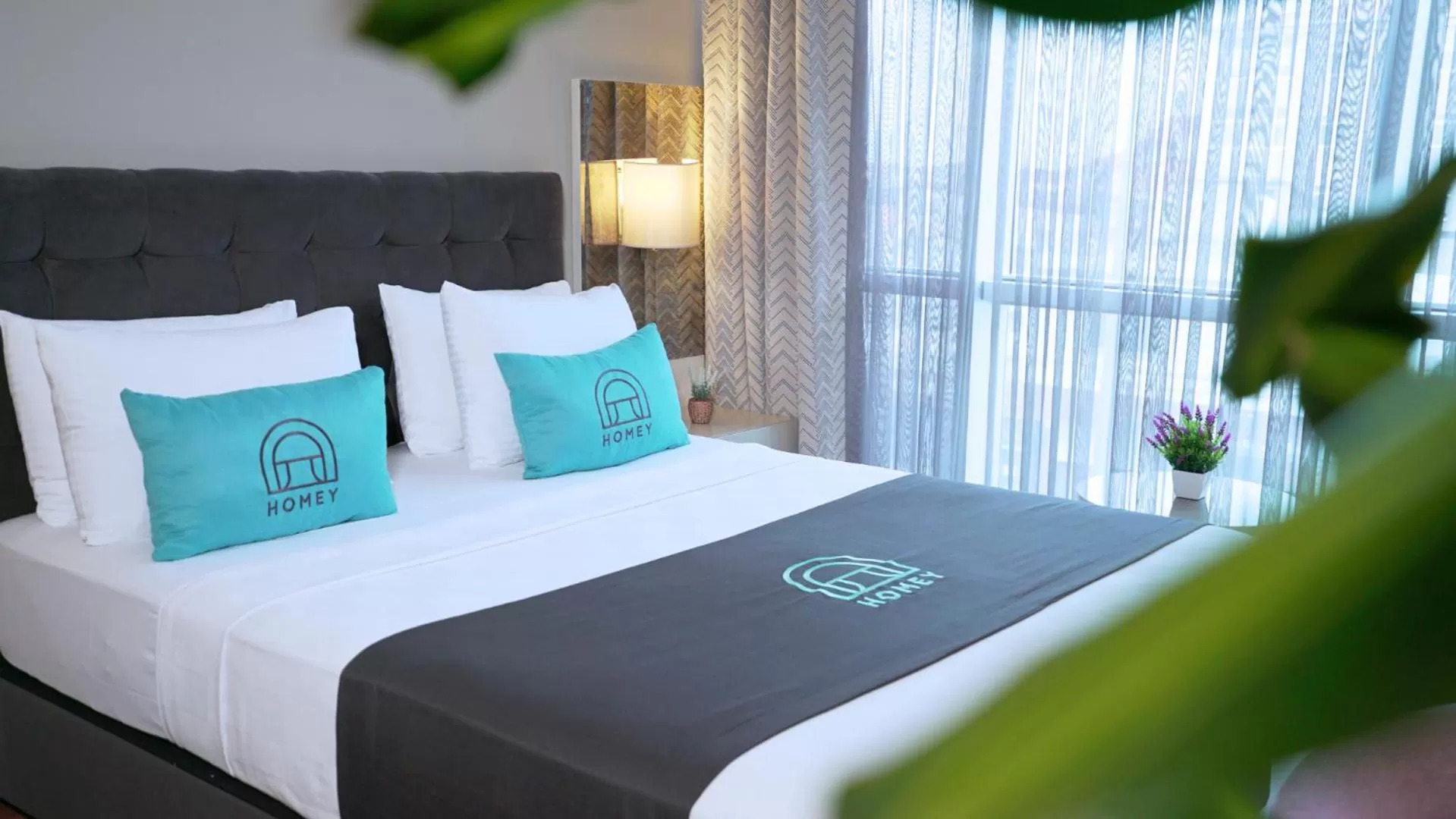 Bed in Homey AirPort Hotel