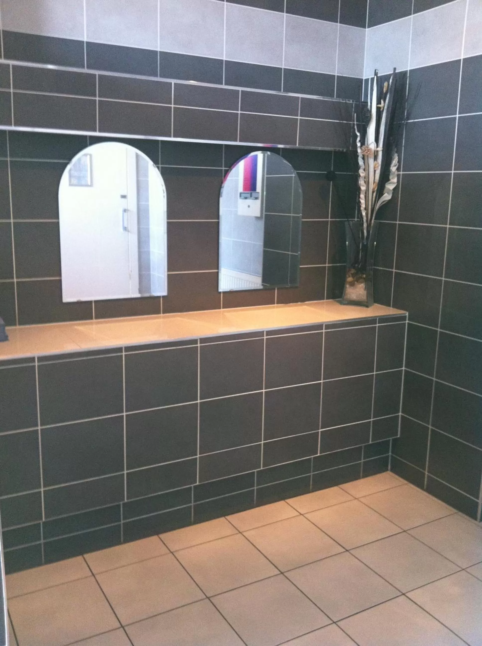 Bathroom in King Robert Hotel