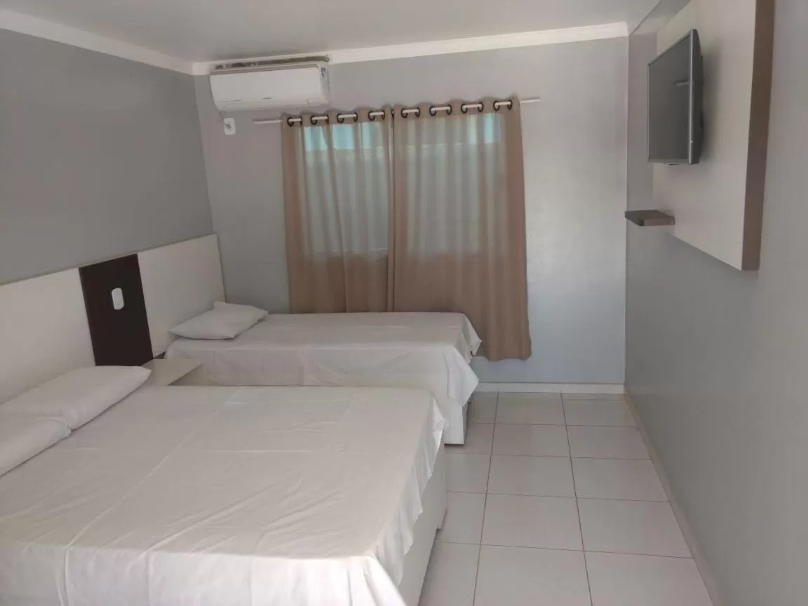 Bed in Hotel Serra do Rio