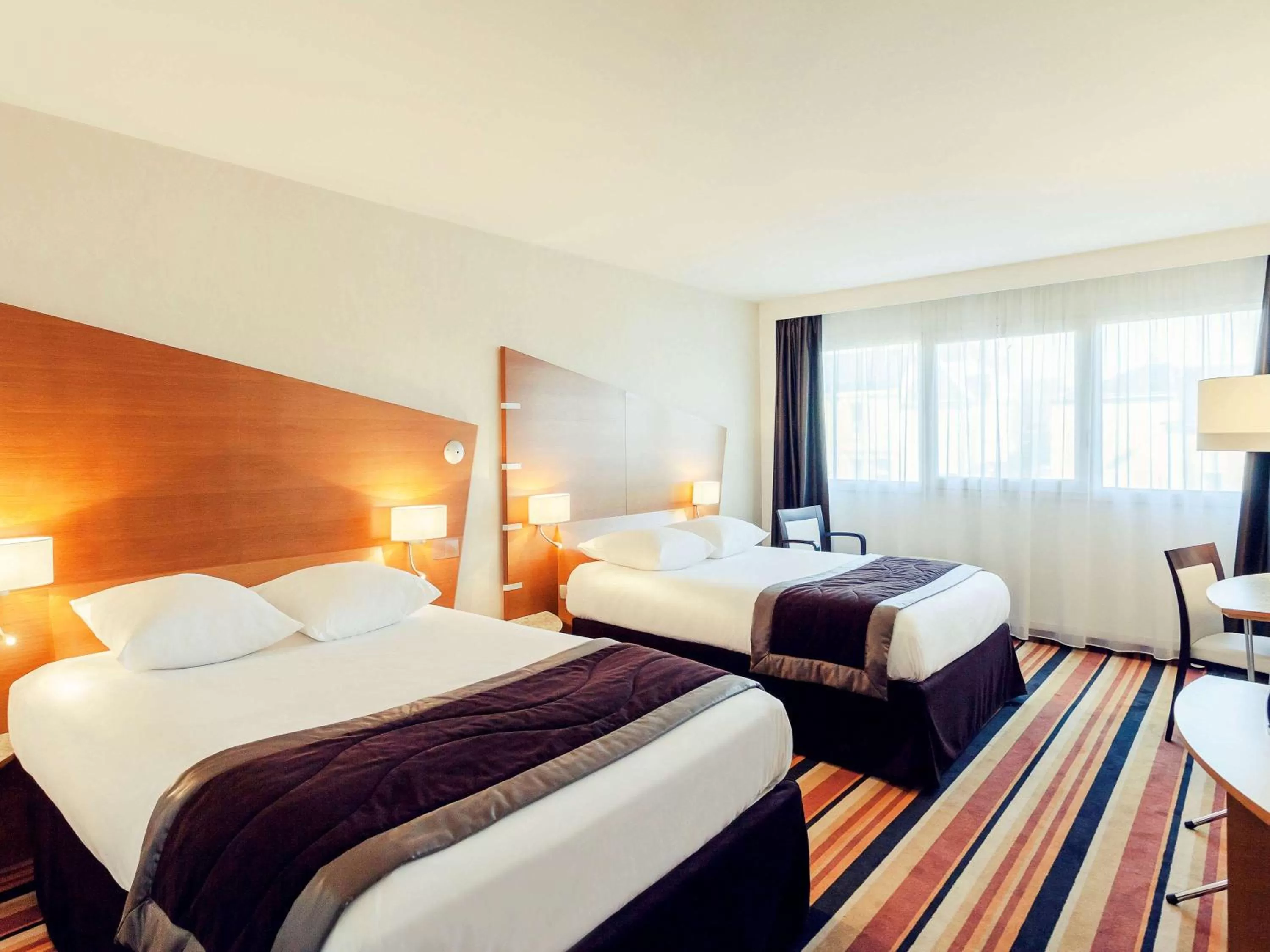 Photo of the whole room, Bed in Mercure Orléans Centre Bords de Loire