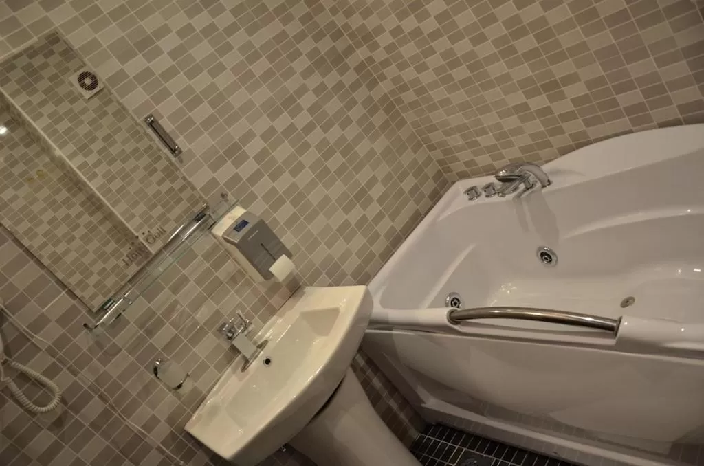 Bathroom in Hotel Golf Luxury