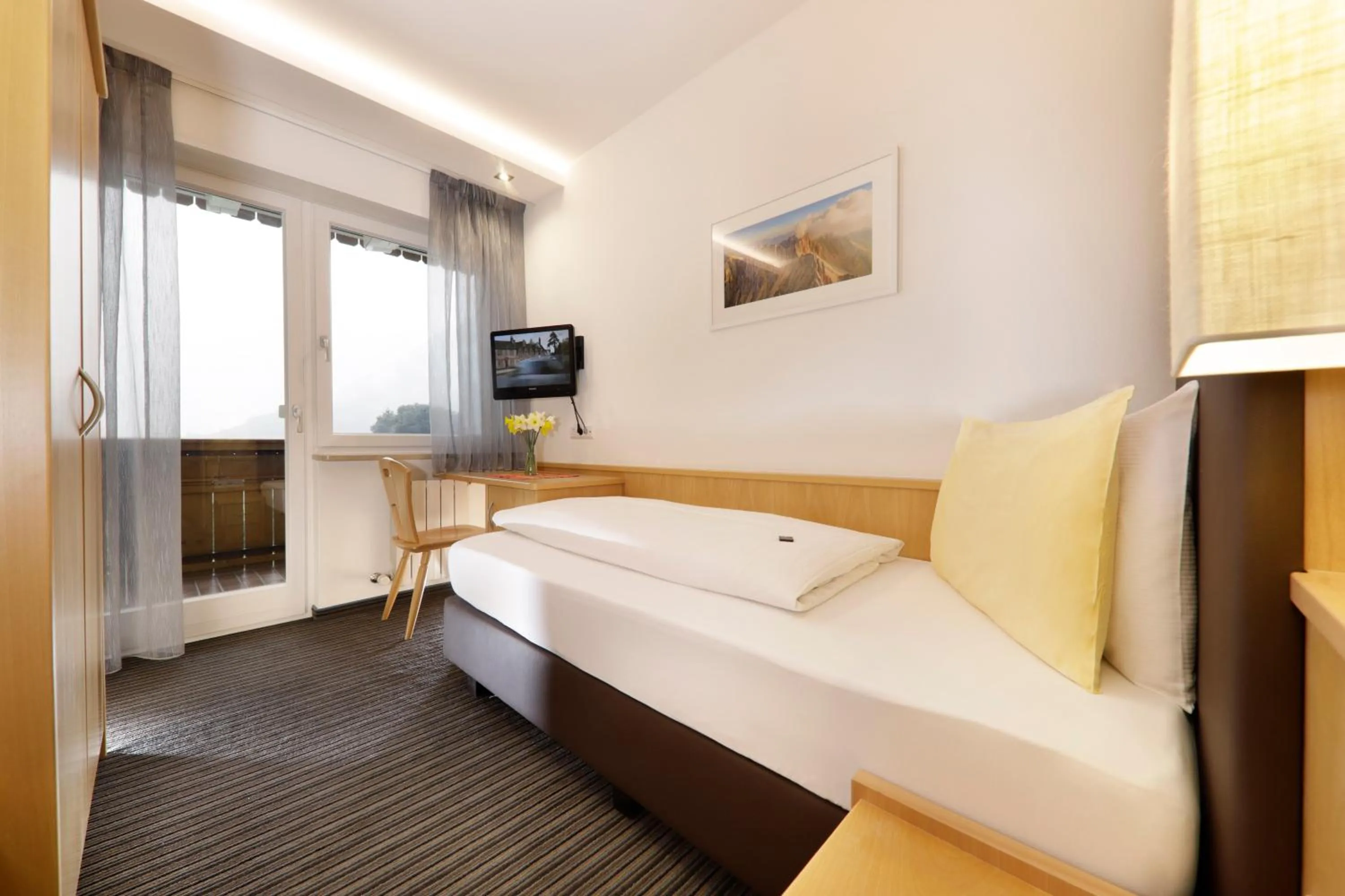 Bed in Das Mitterplarser Hotel