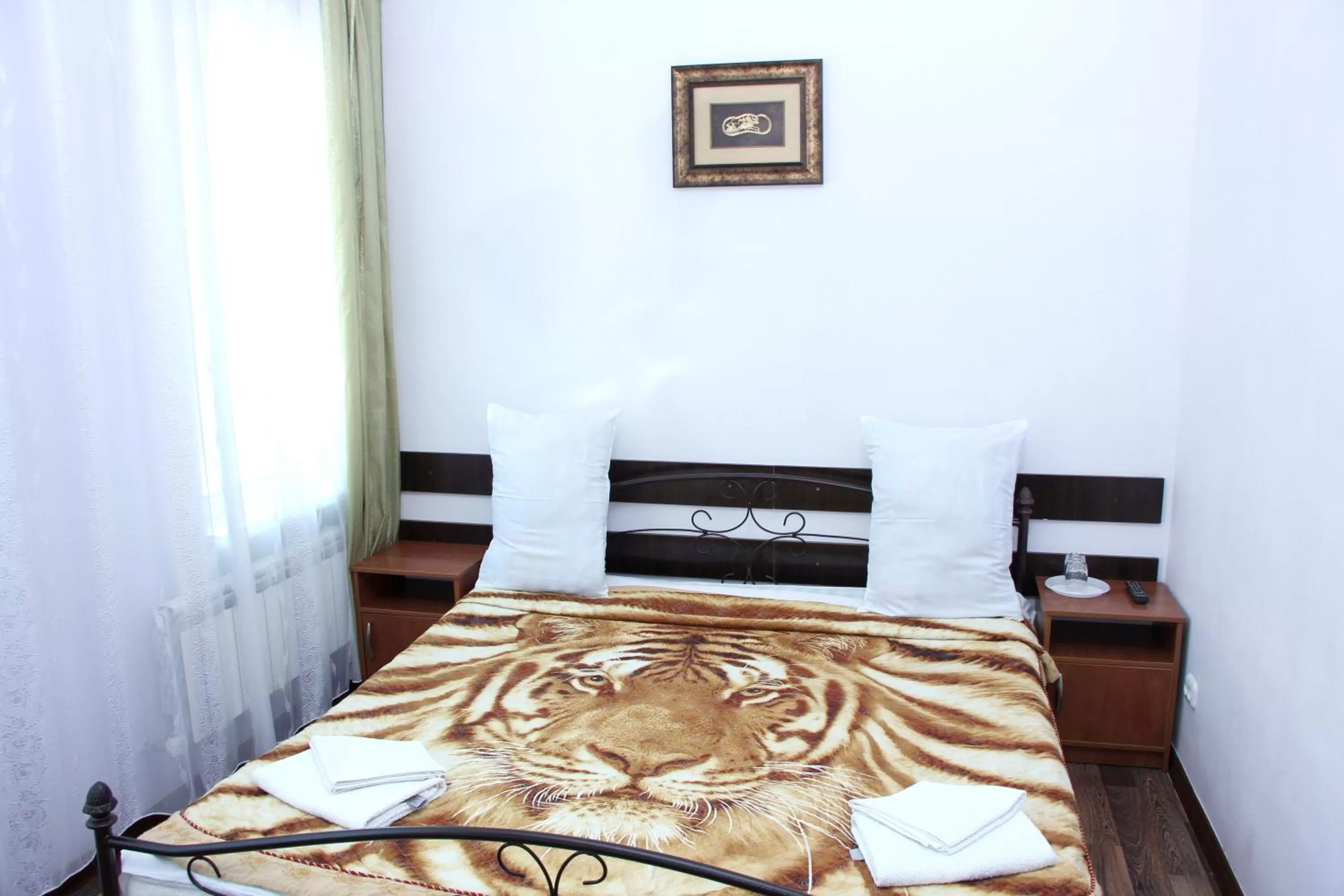 Bed in Zhaylau Hotel