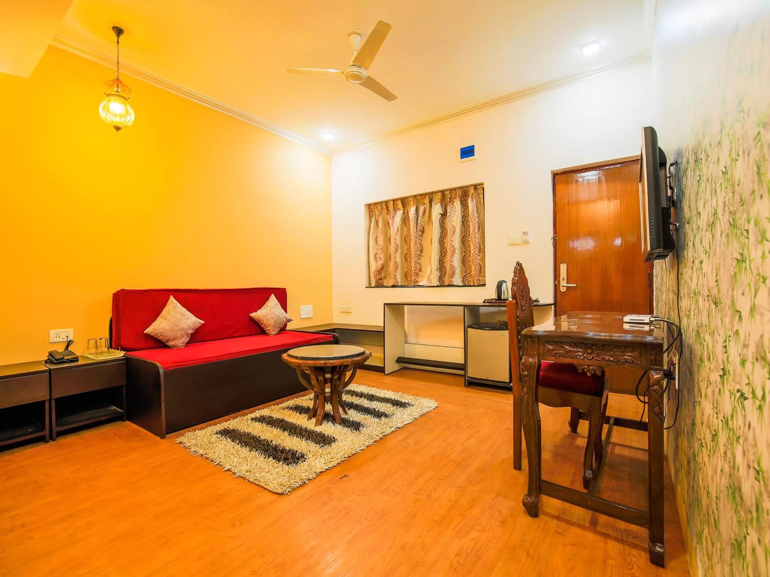 Living room in The Center Court Resort & Spa