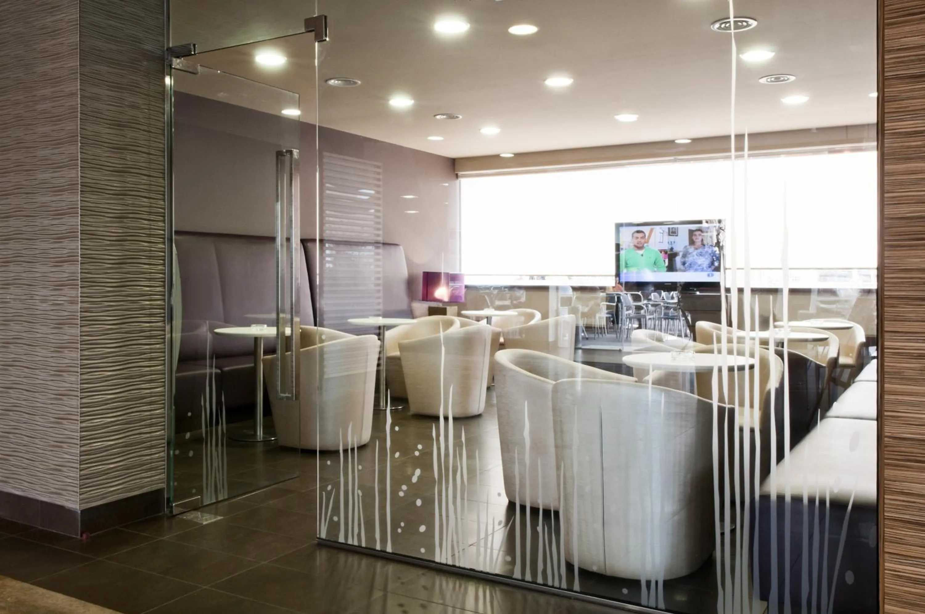 Communal lounge/ TV room in Hotel Augustus