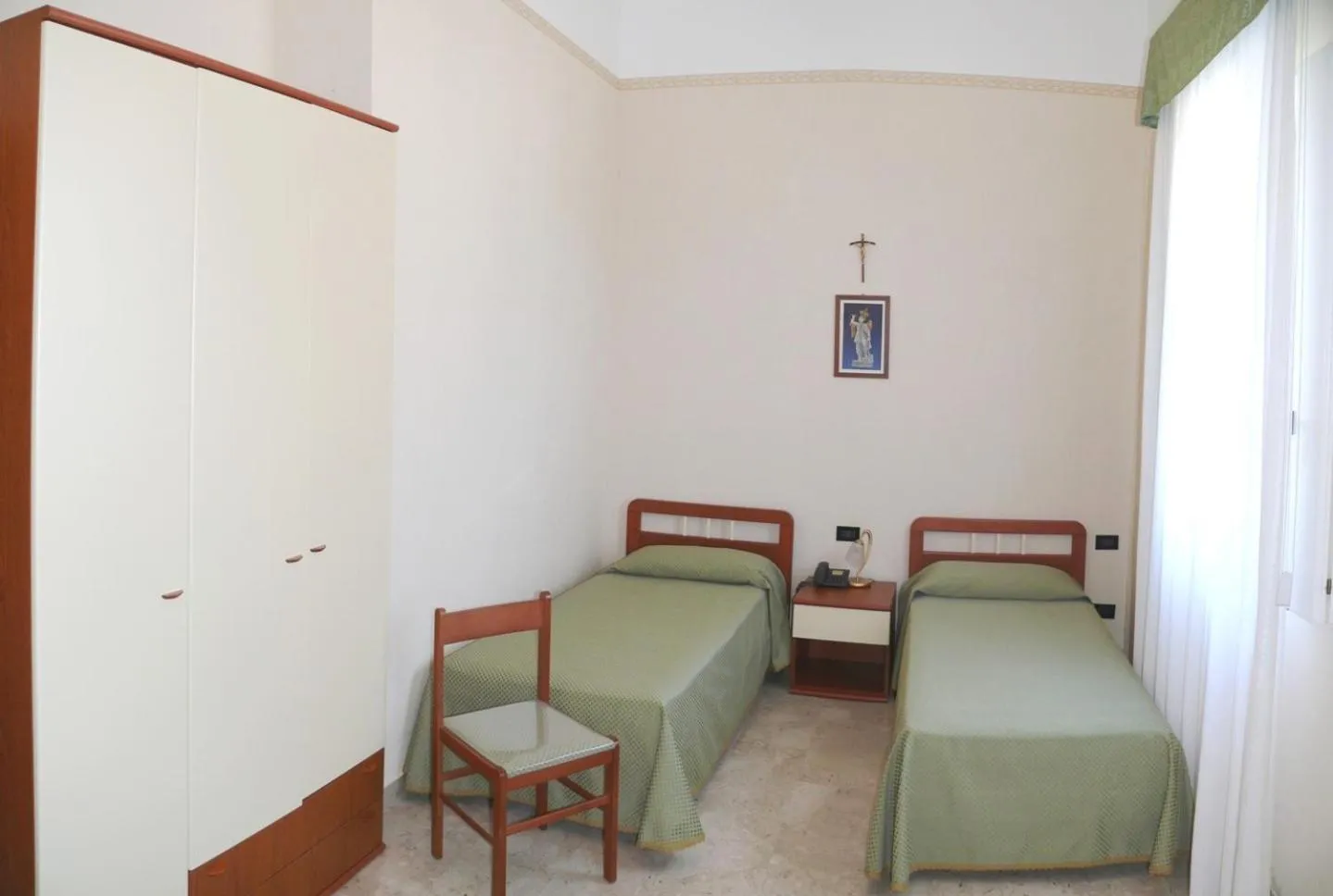 Bed in Albergo Casa Del Pellegrino