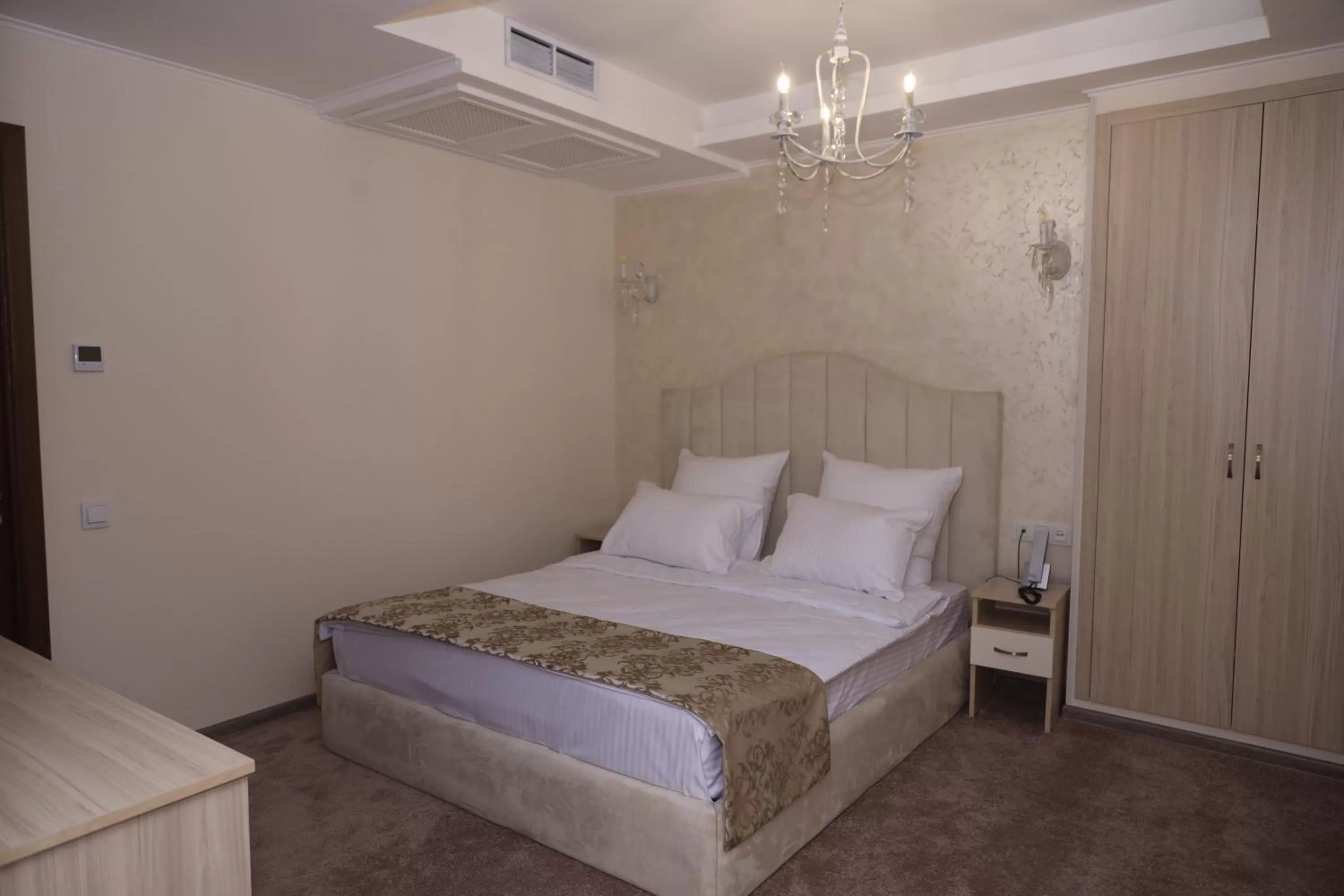 Bed in DeLin Hotel And Tours