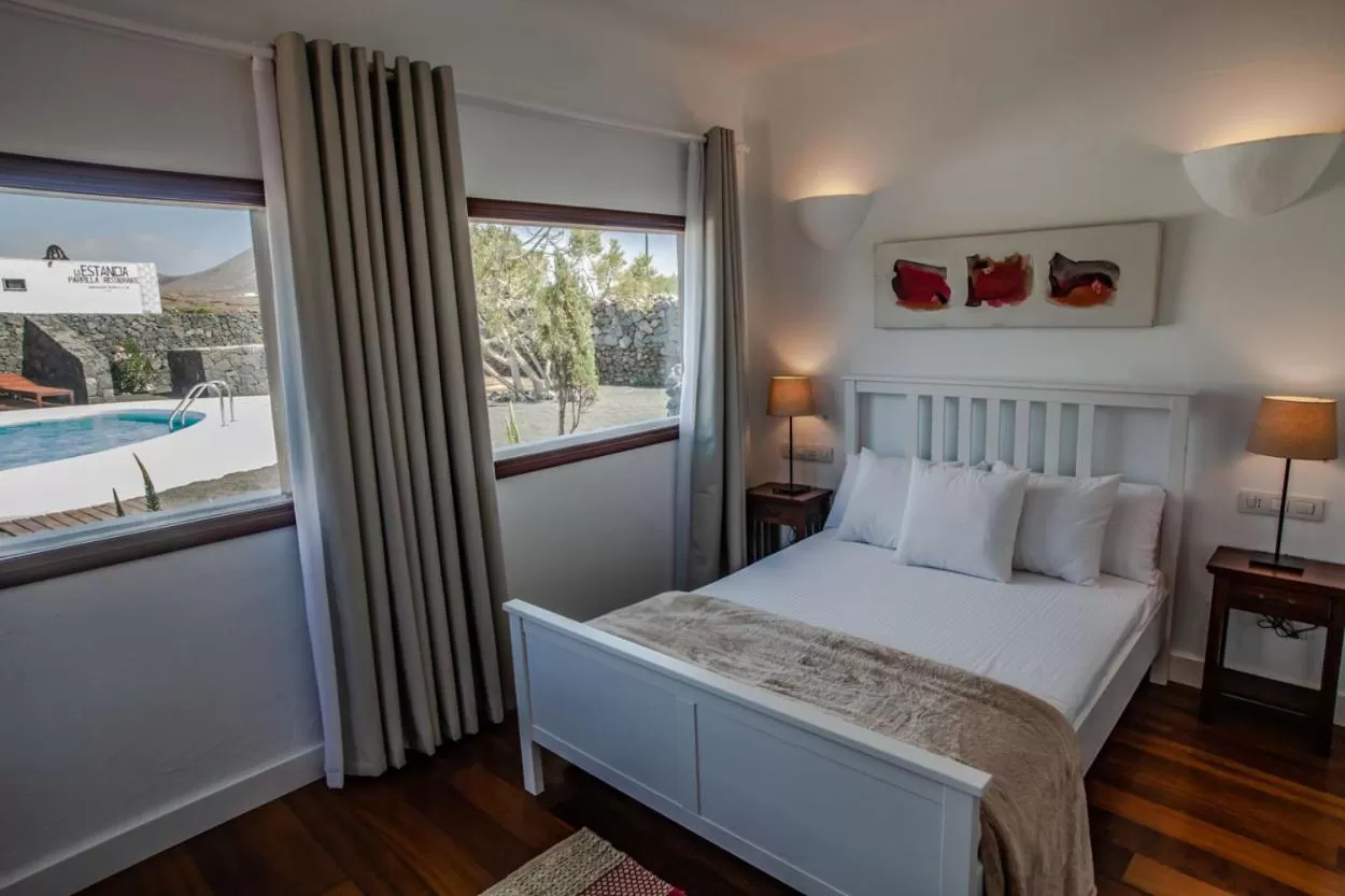 Bed in Los Lirios Hotel Rural - Adults Only