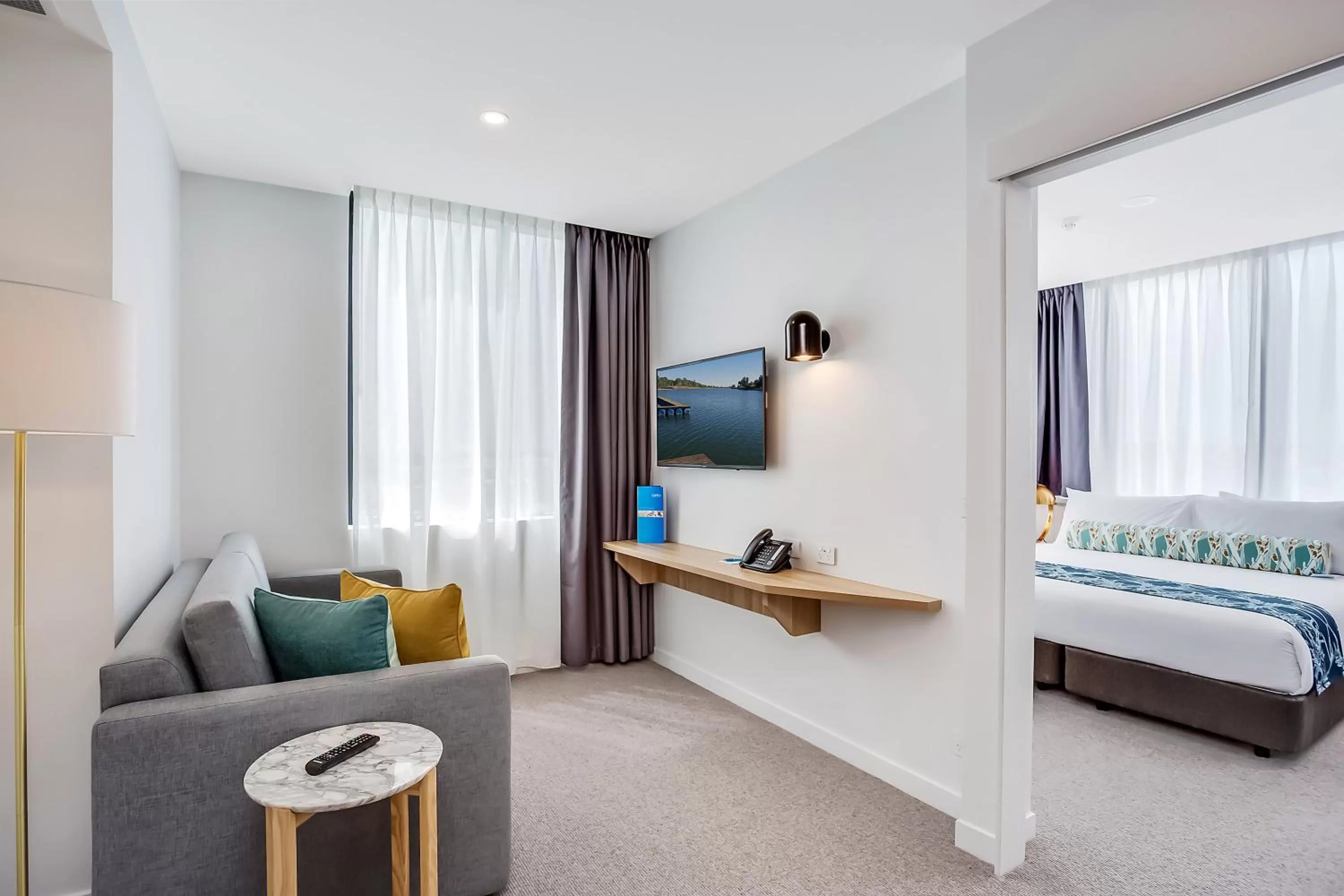 Living room, Bed in Mantra at Sharks