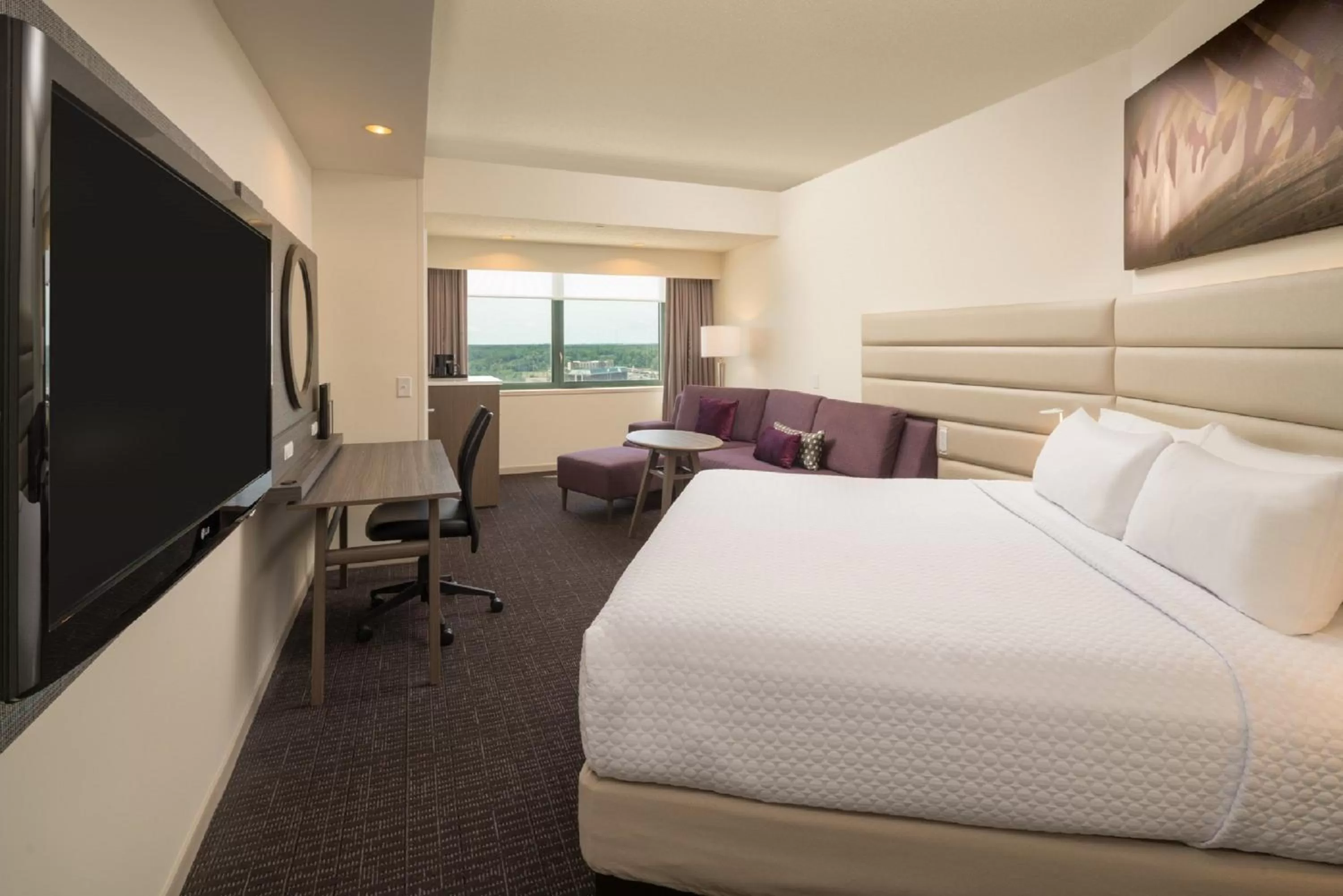 Photo of the whole room, Bed in Crowne Plaza Springfield Convention Center by IHG