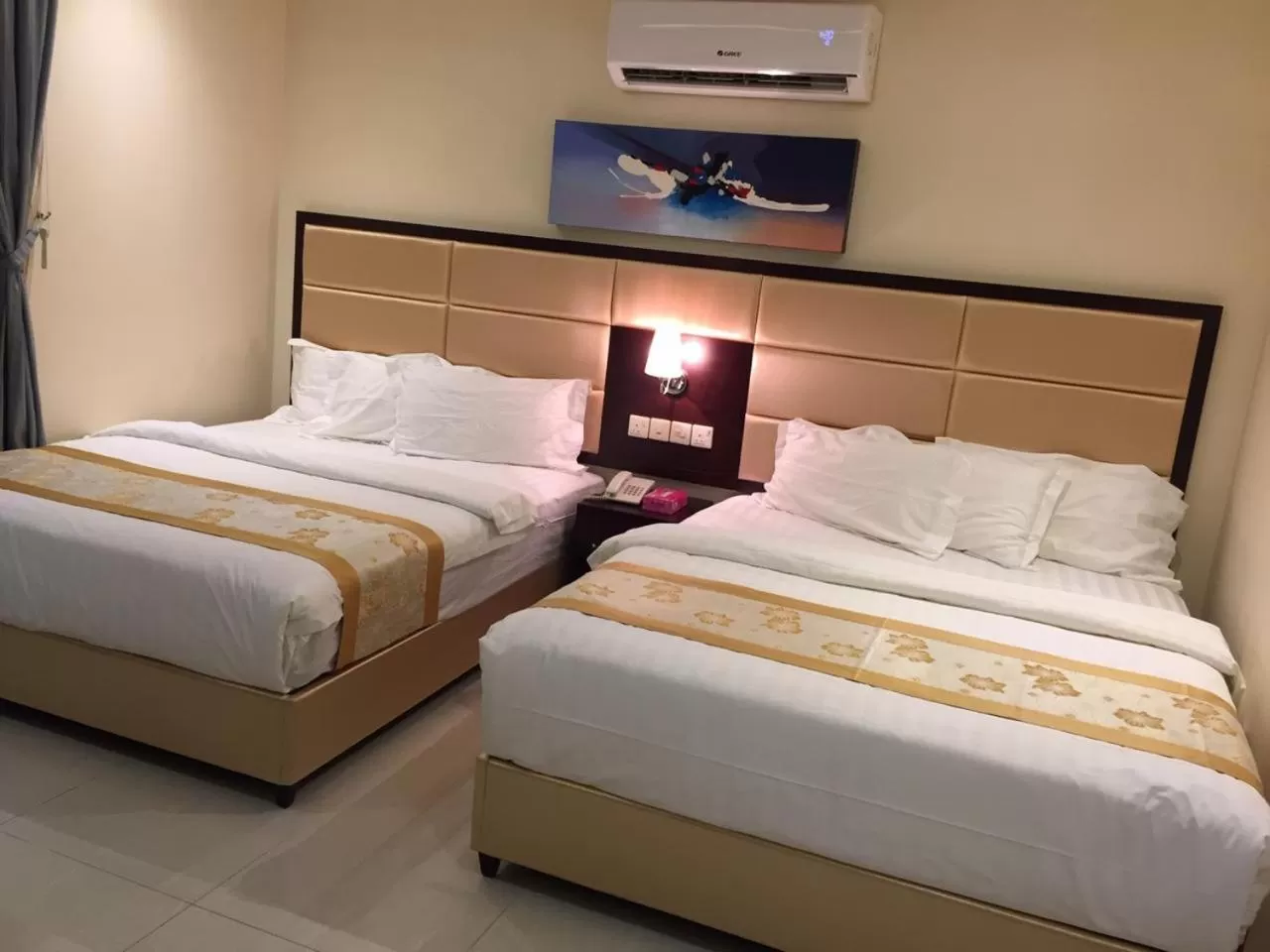 Bed in Arjaan Altakhassusi Hotel Suites