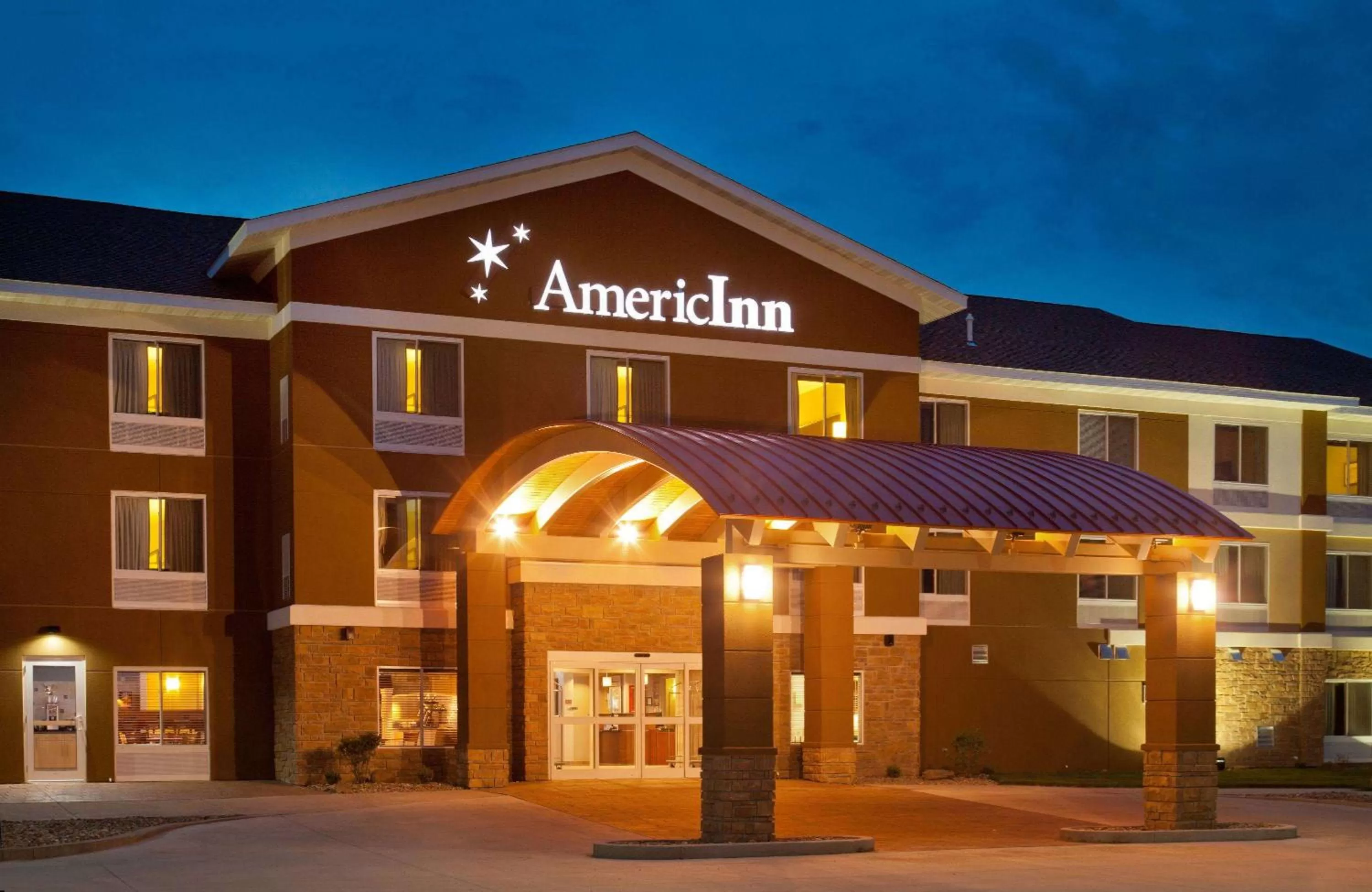 Property building in AmericInn by Wyndham Fairfield