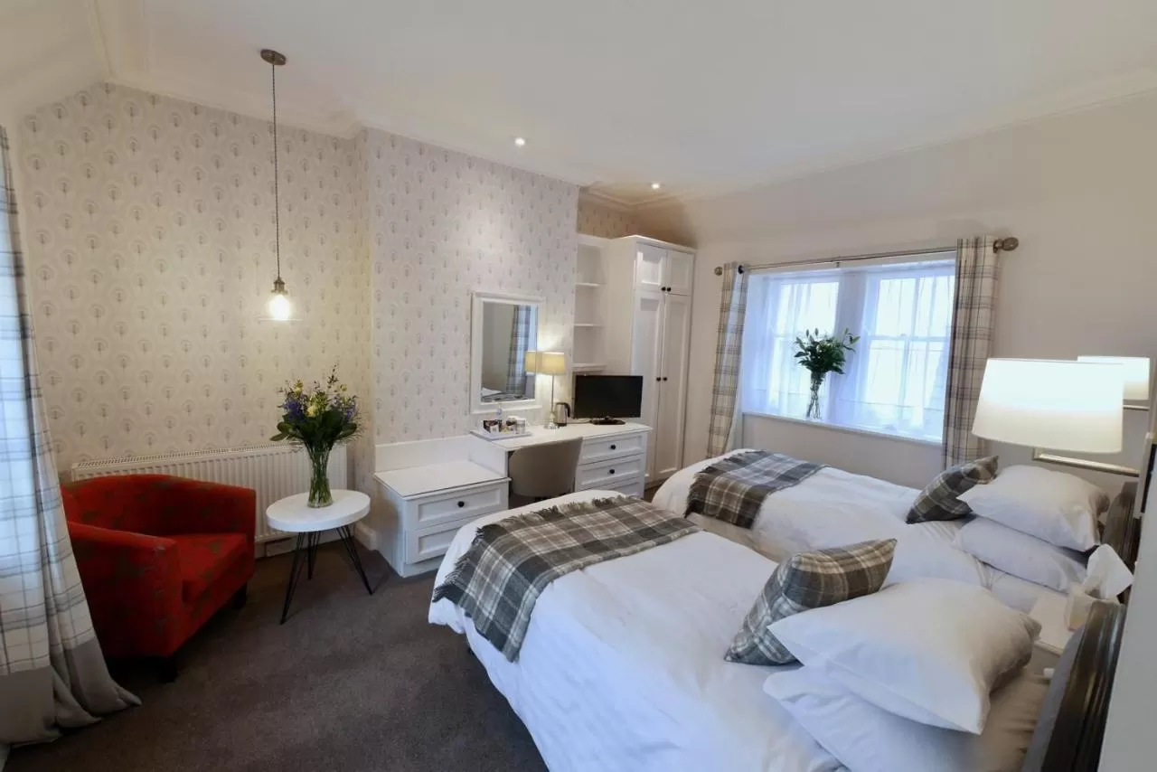 Bed in Selkirk Arms Hotel