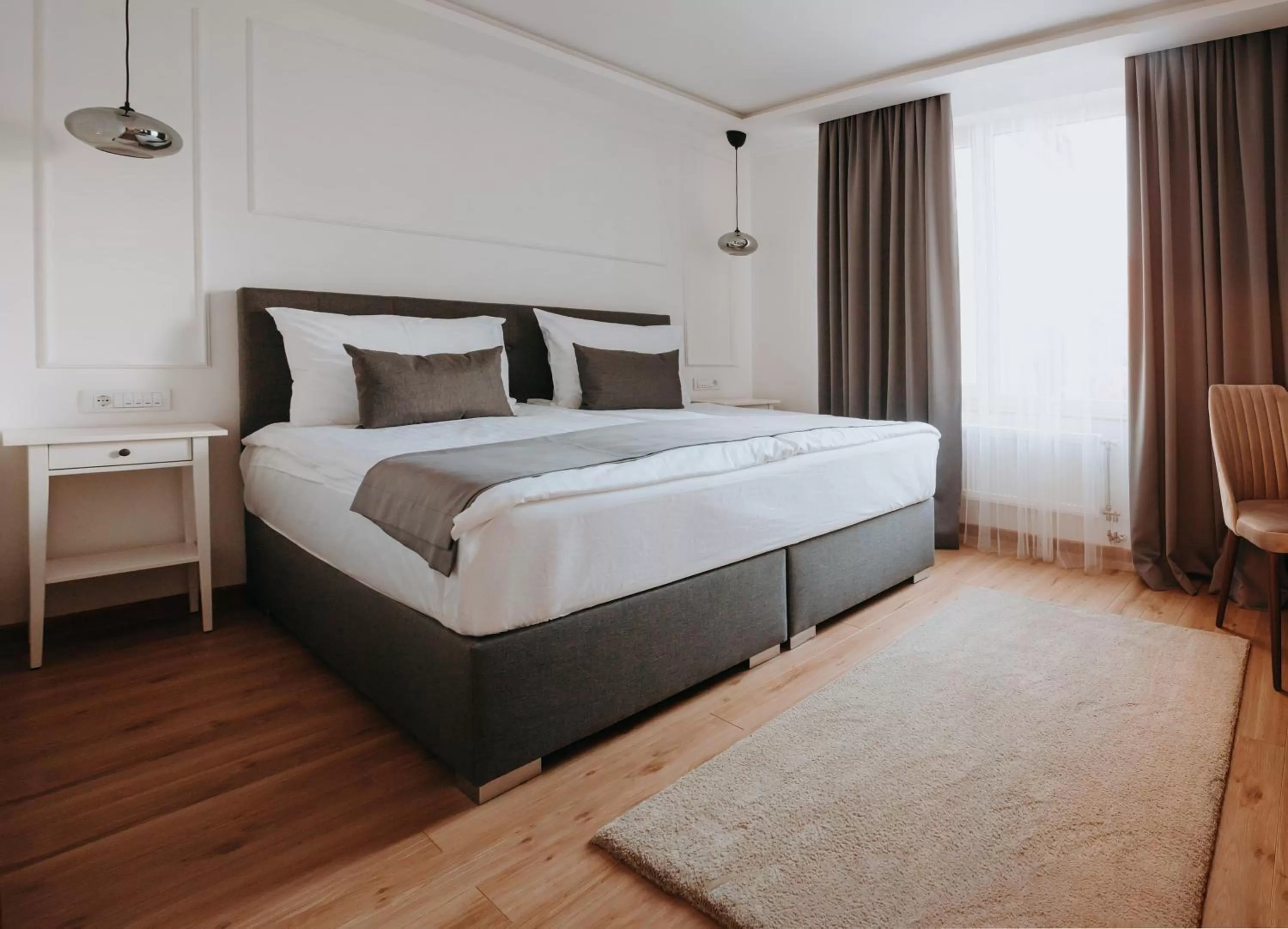 Bed in Boutique Hotel Nea