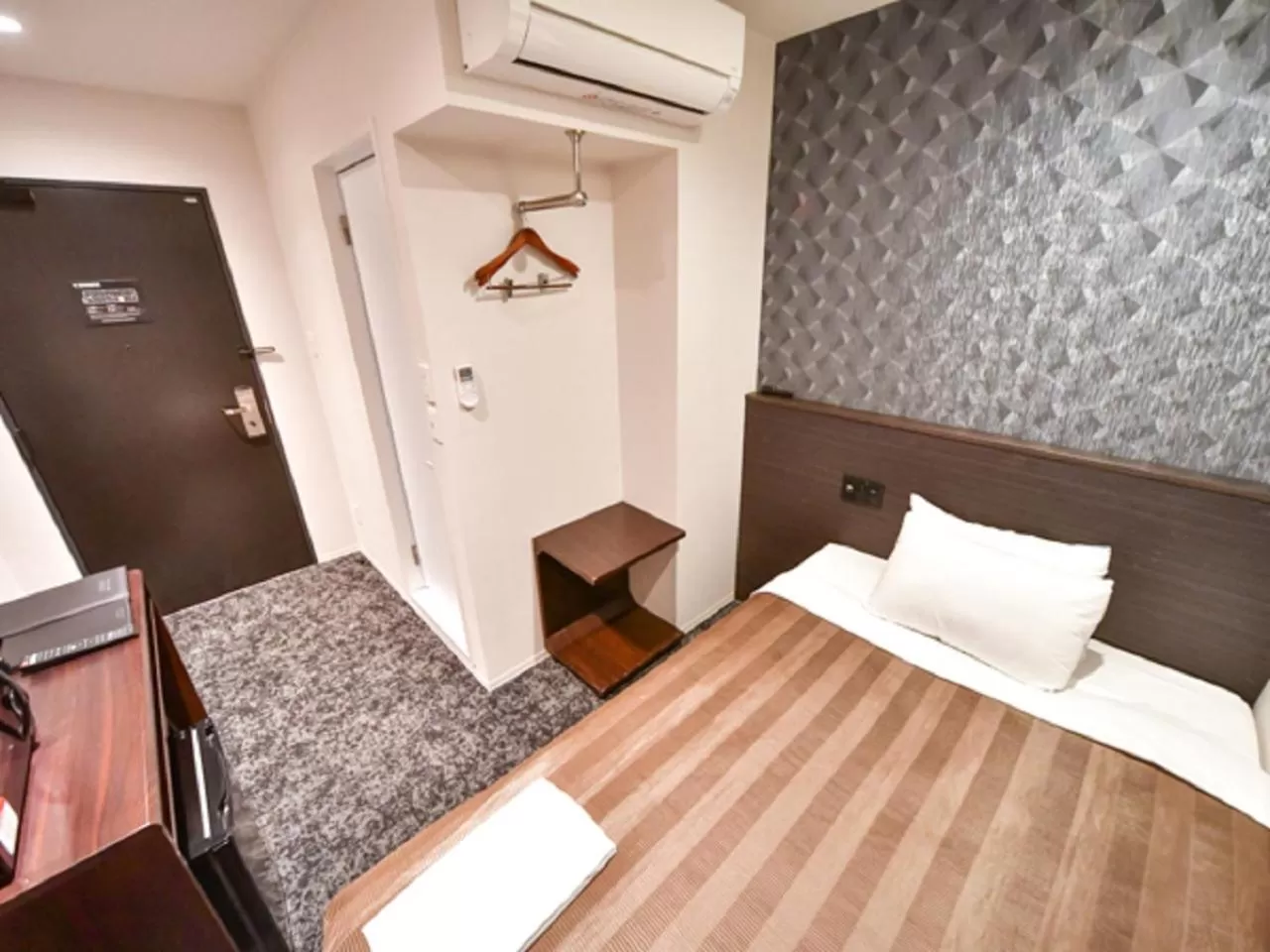 Photo of the whole room, Bed in HOTEL LiVEMAX Hakataekimae