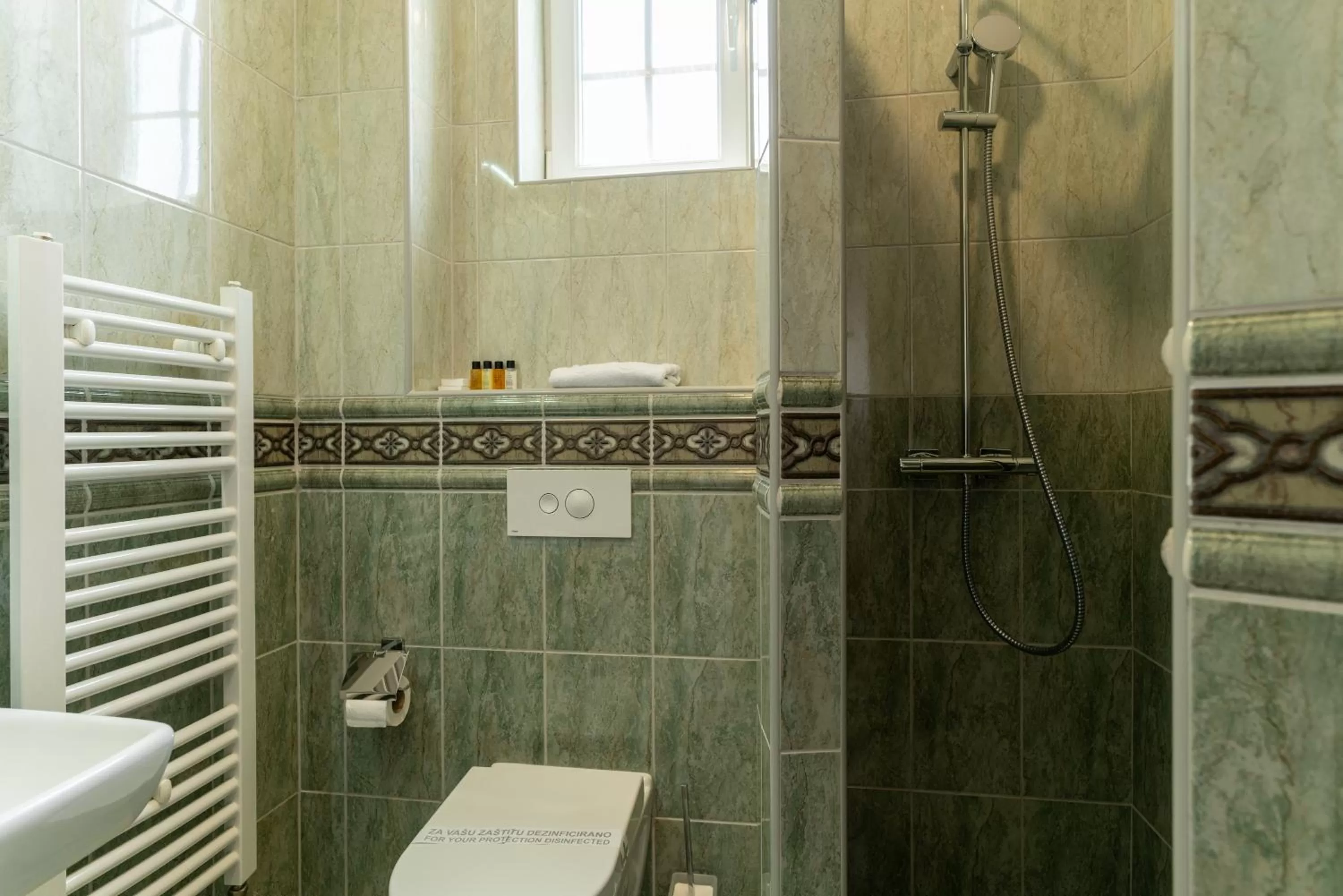 Shower in Ornament Hotel