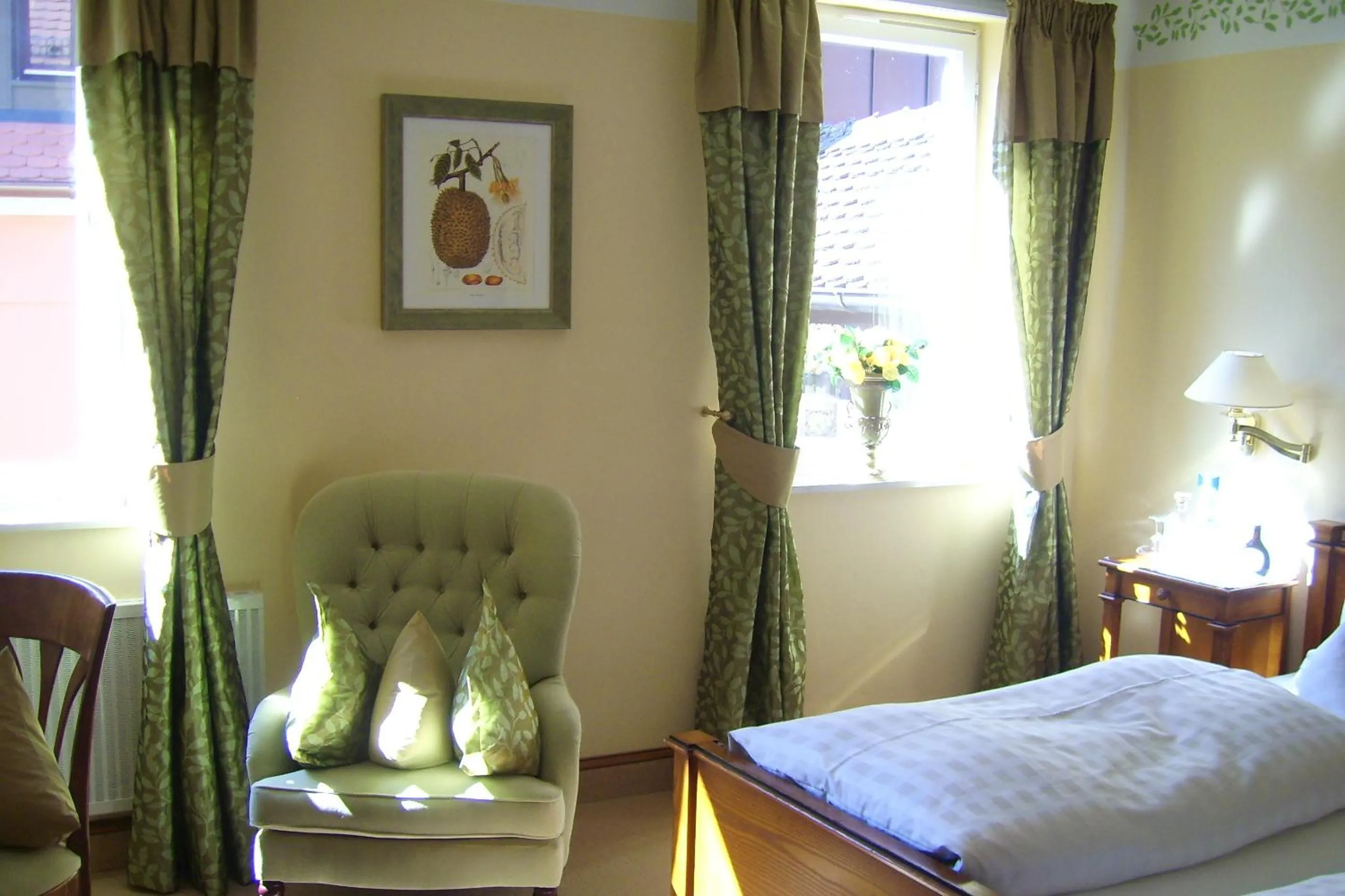 Photo of the whole room, Bed in WAGNERS Hotel Greifen-Post