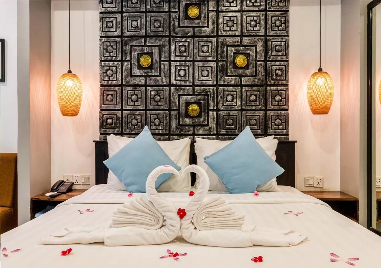 Bed in Ladear Privilege Rooms